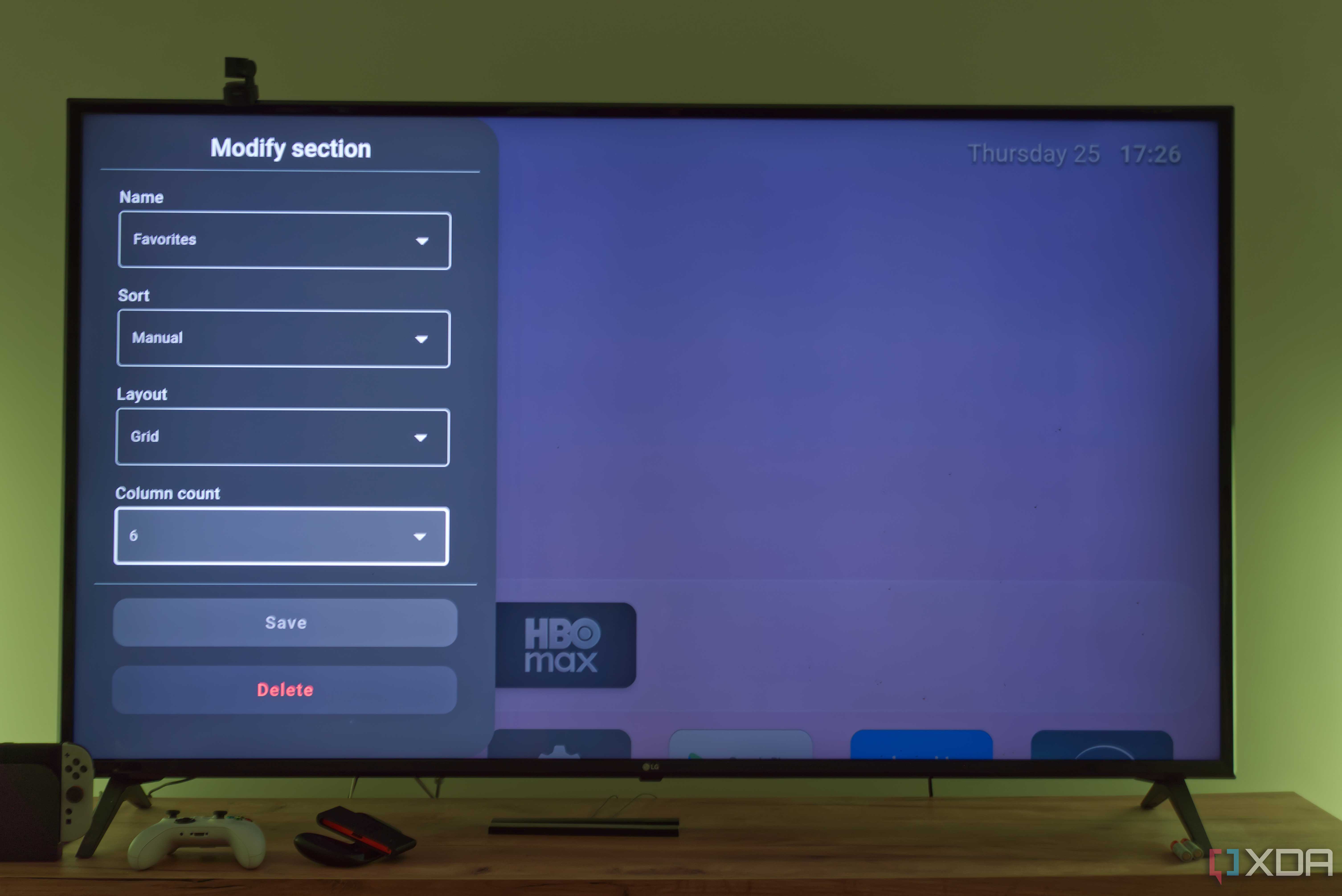 A TV displaying settings for customizing a section in Arc Launcher