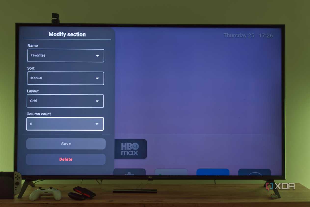 A TV displaying settings for customizing a section in Arc Launcher