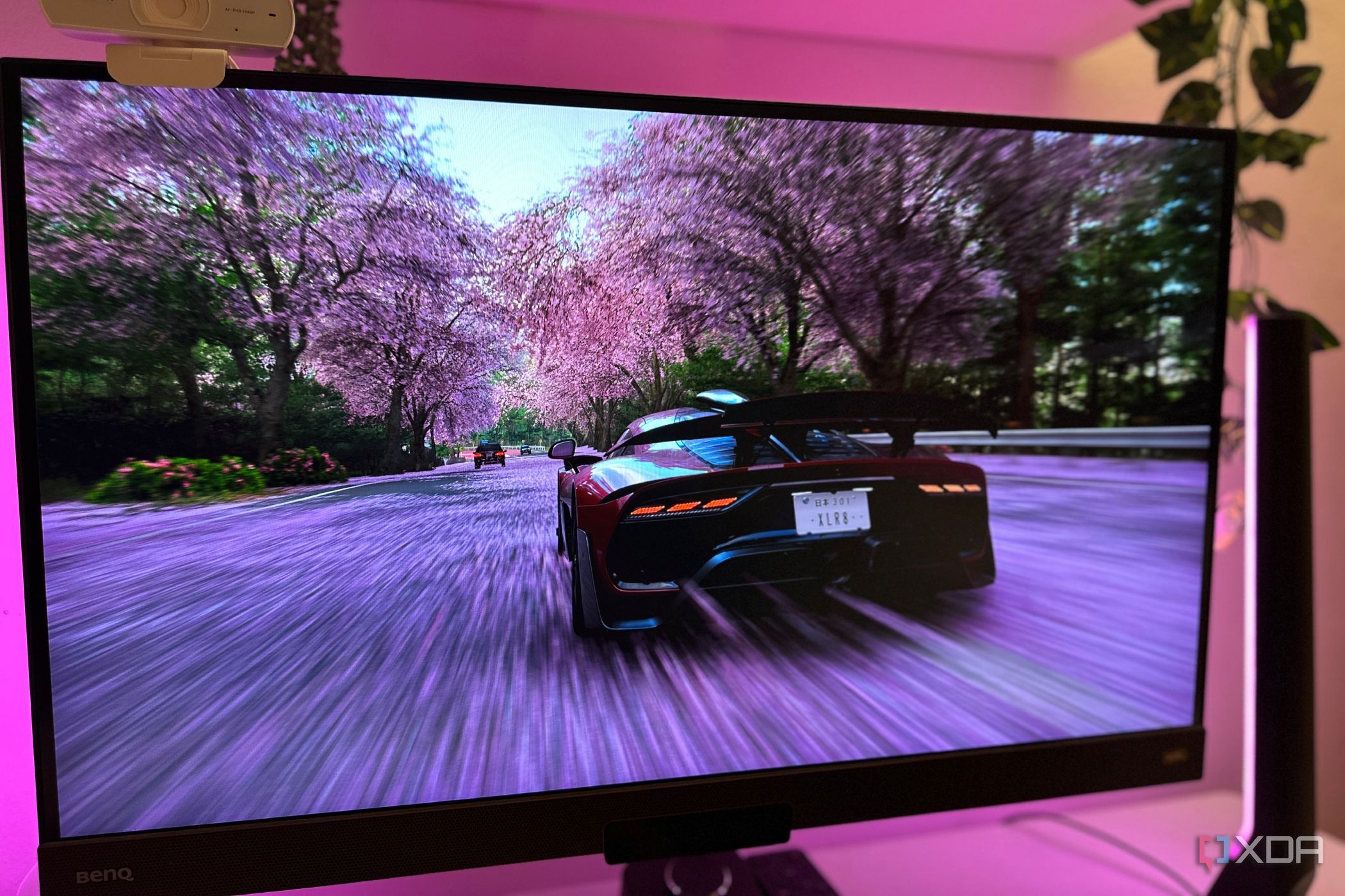 Mercedes AMG One driving through sakura-lined roads in Forza Horizon 6.