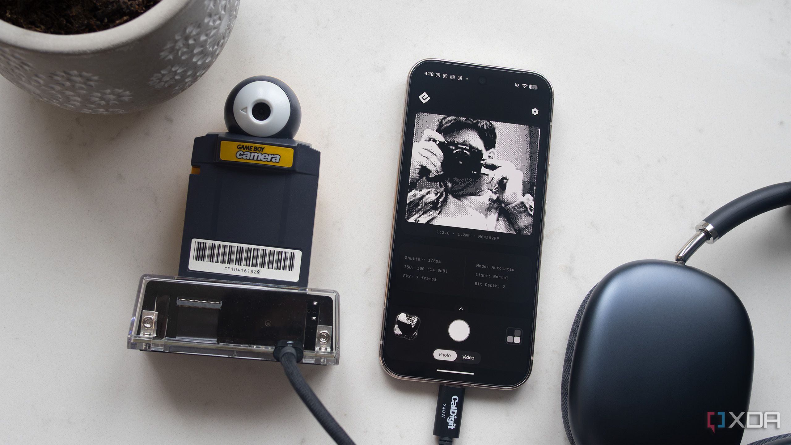 The Game Boy Camera hooked up to a Pixel 10 Pro with the Flashback app 