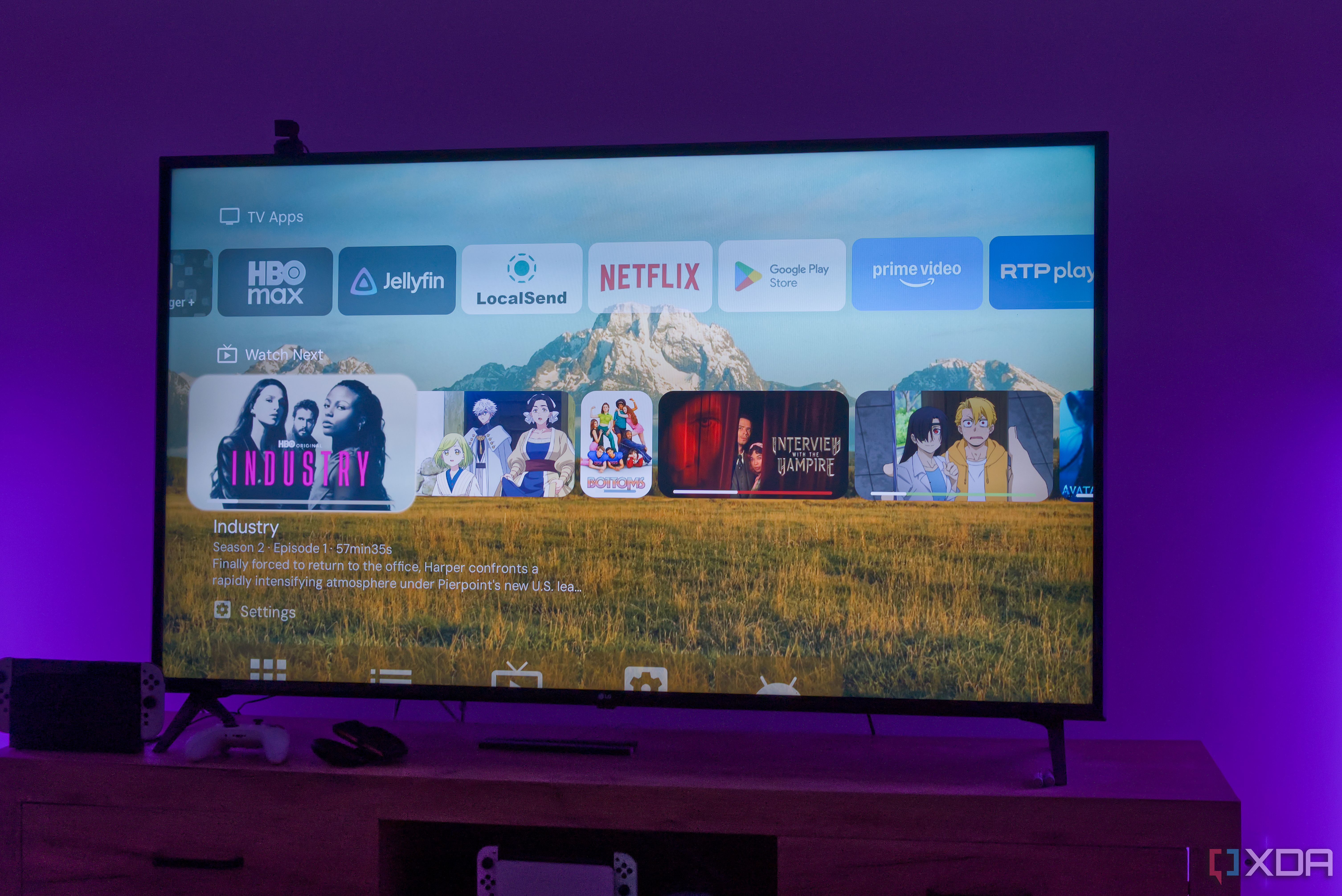 A TV displaying the home screen in Projectivy launcher for Android TV