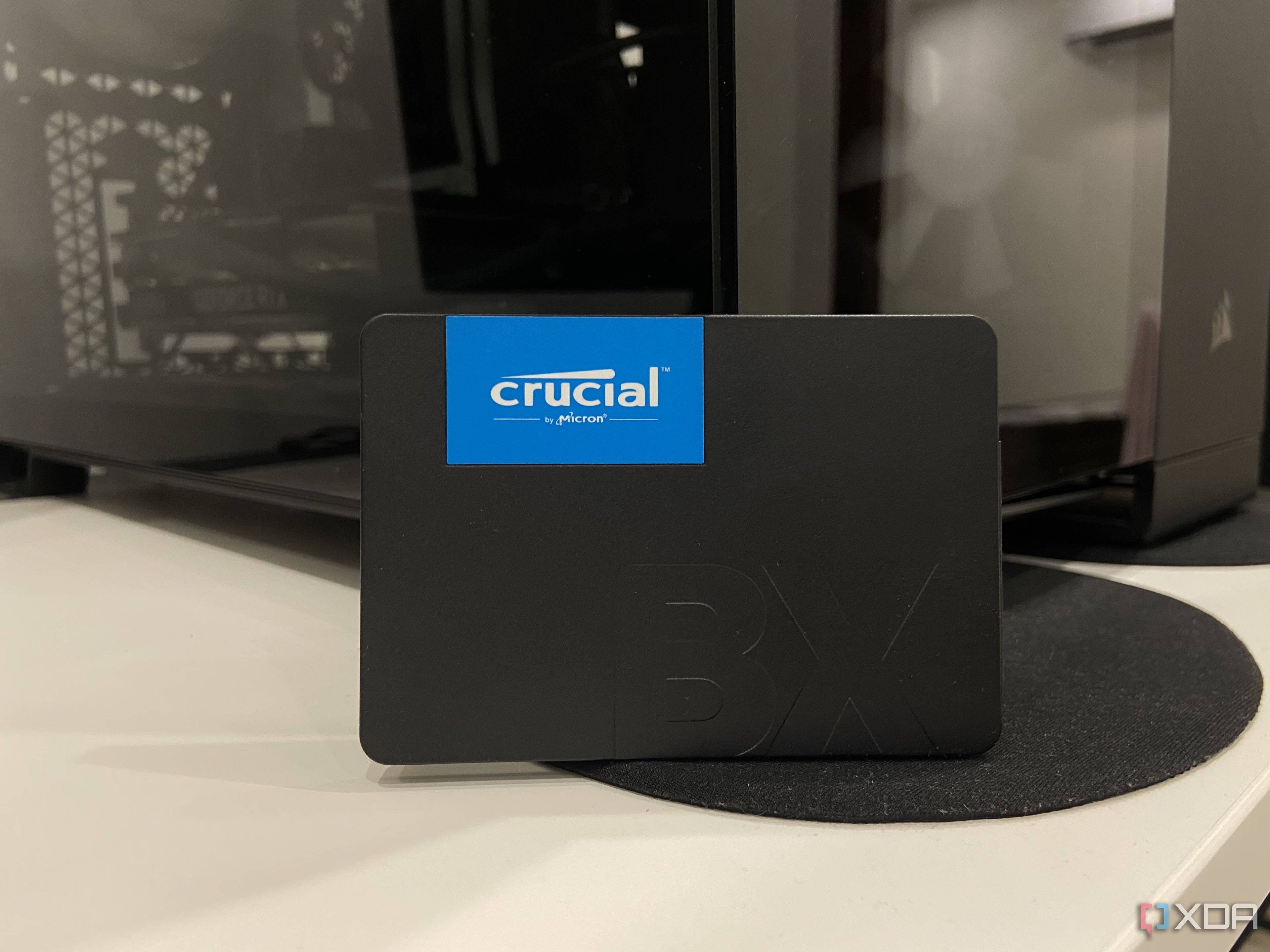 A Crucial SSD against a gaming PC.