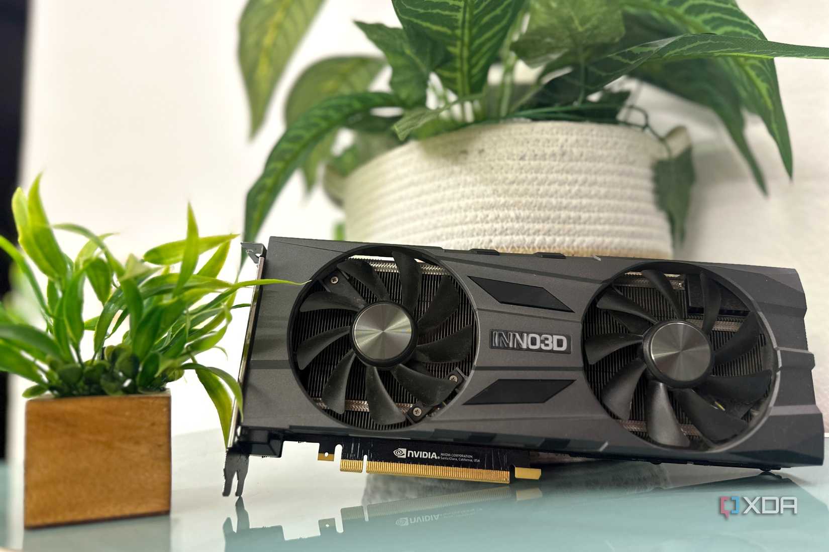 The Nvidia RTX 2070 Super GPU is standing around with some plants.