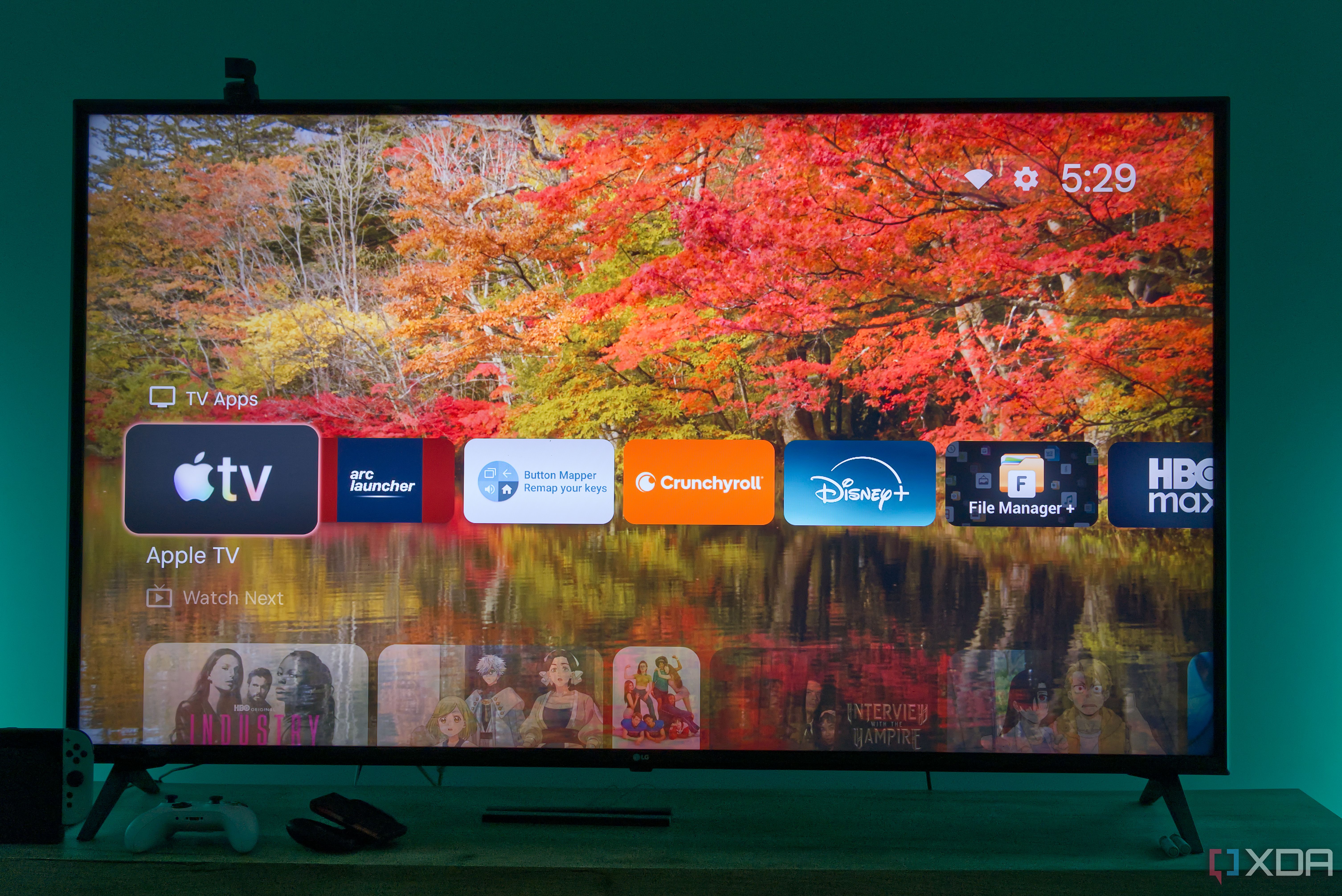 A TV displaying the home row in Projectivy launcher for Android TV