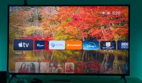 A TV displaying the home row in Projectivy launcher for Android TV