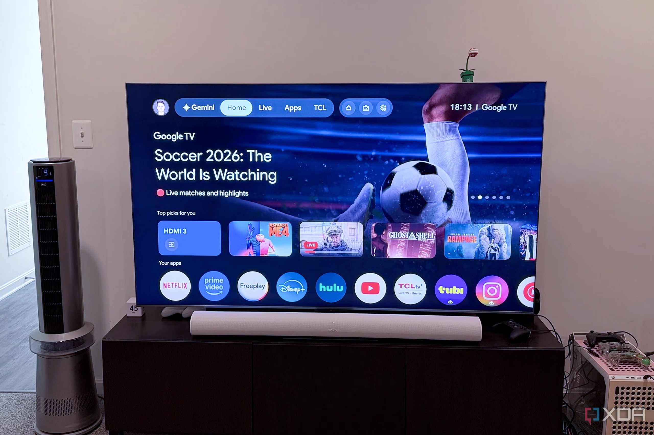 tcl qm9k showing google tv advertising soccer