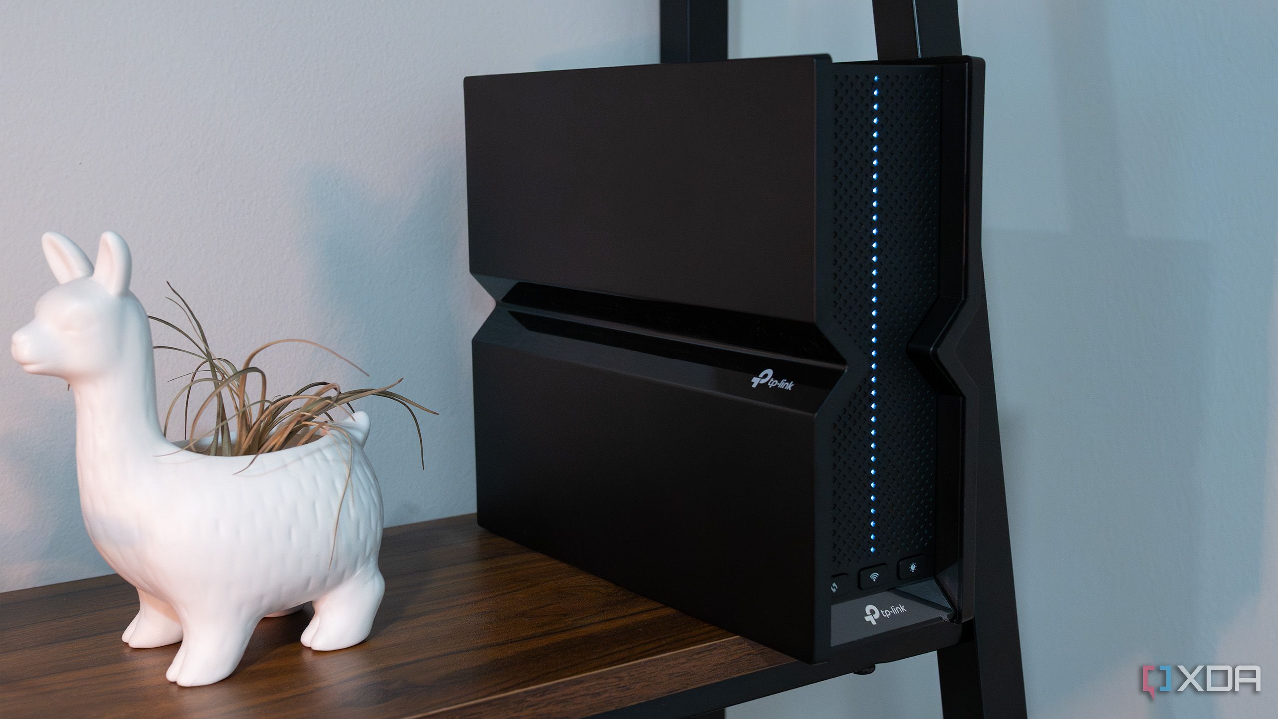 TP-Link's Archer BE9300 sitting on a shelf