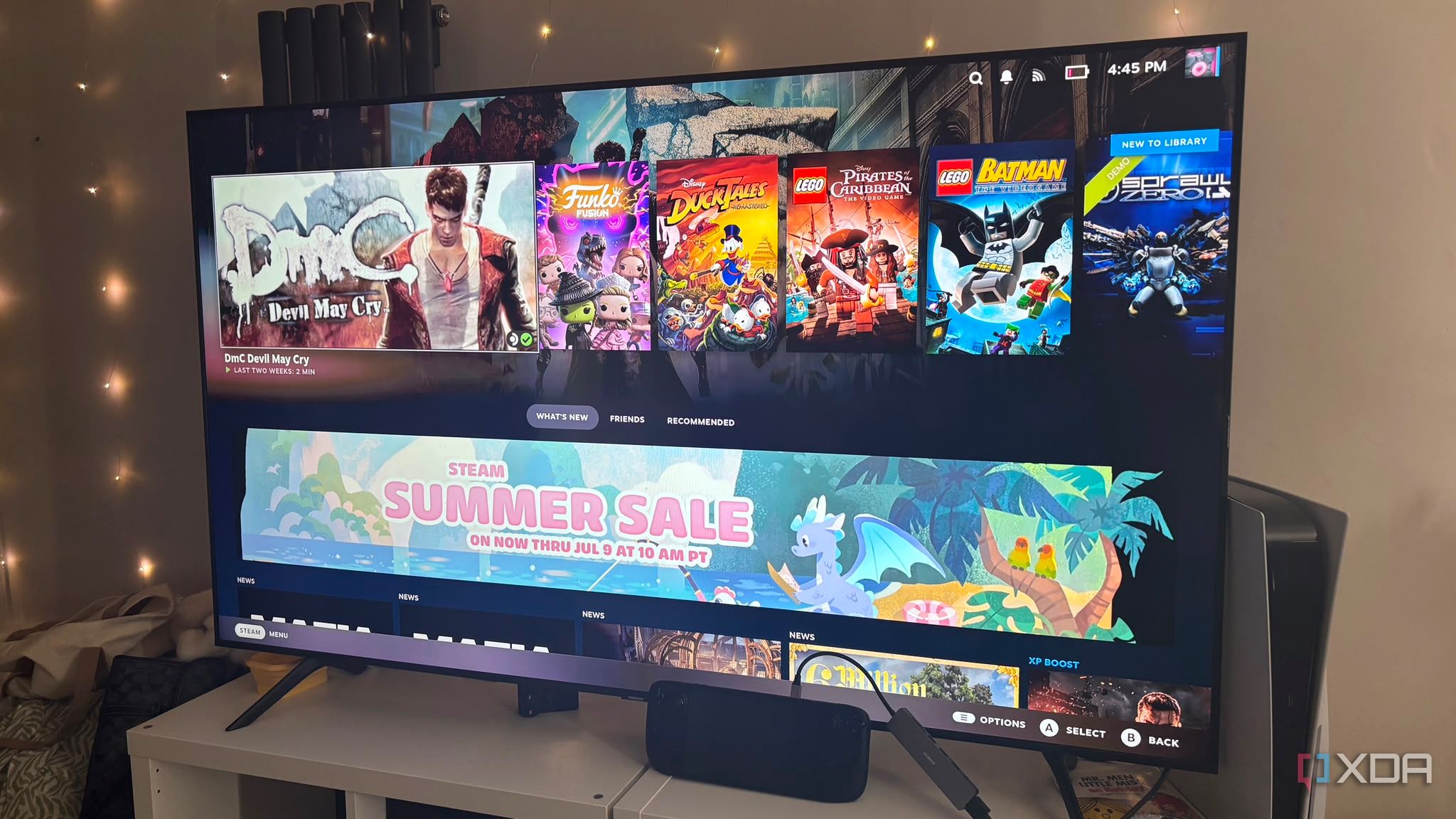 Steam Deck docked to TV steamos on screen