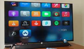 A smart TV running Apple TV 4K showing the Steam Link app icon