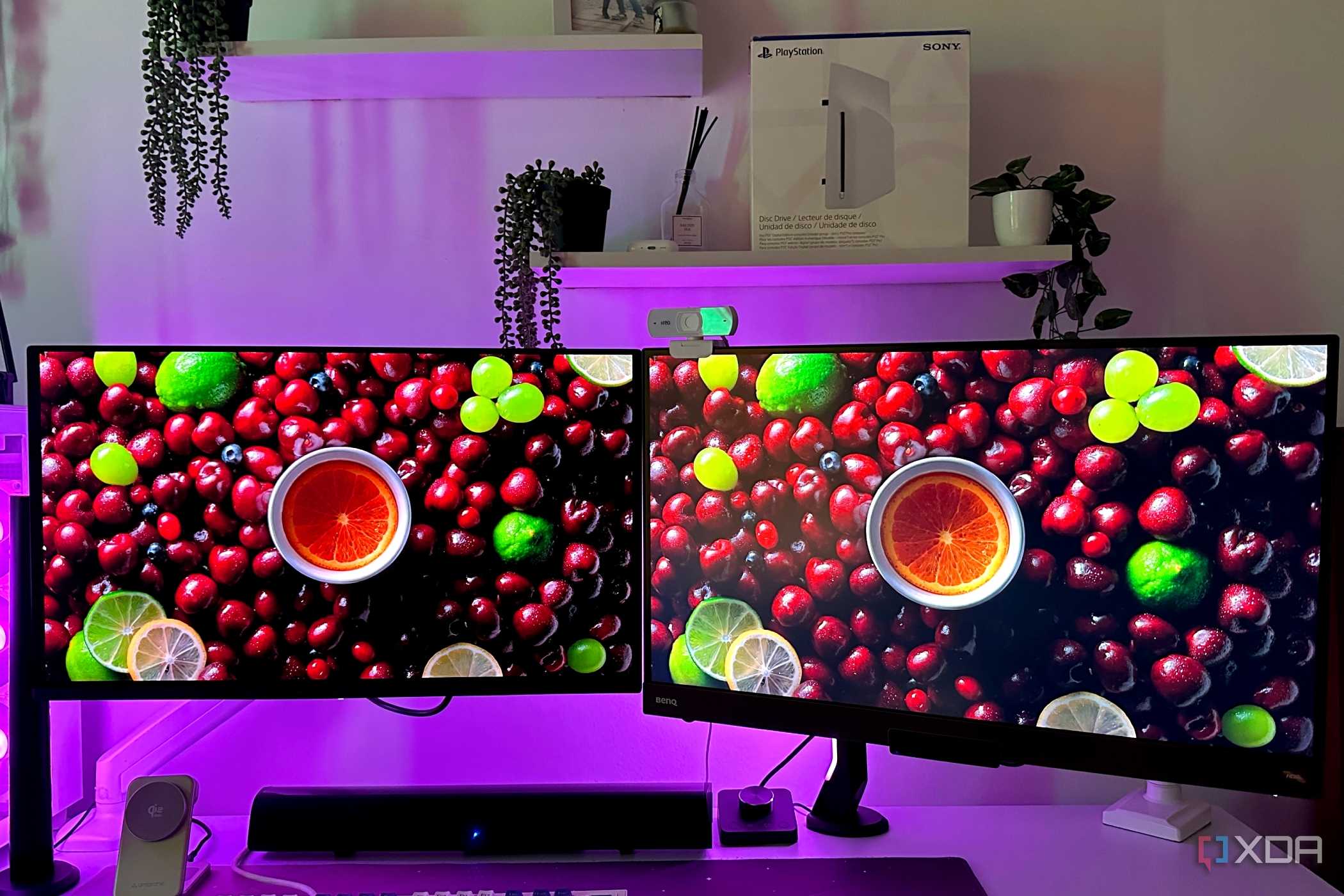 Dual monitor setup with an OLED and IPS display.