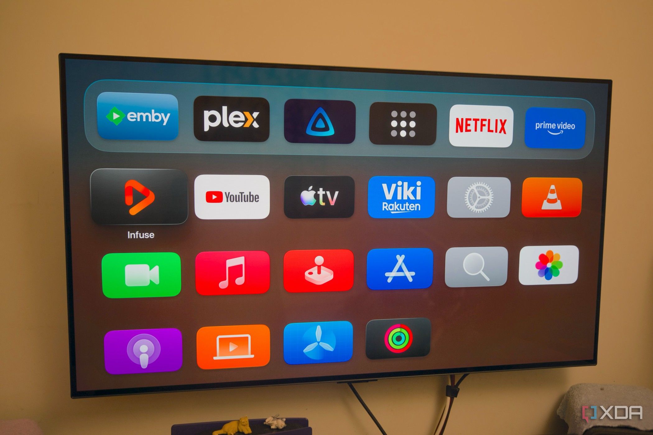 Photo of Emby, Plex, and Jellyfin app icons on Apple TV 4K