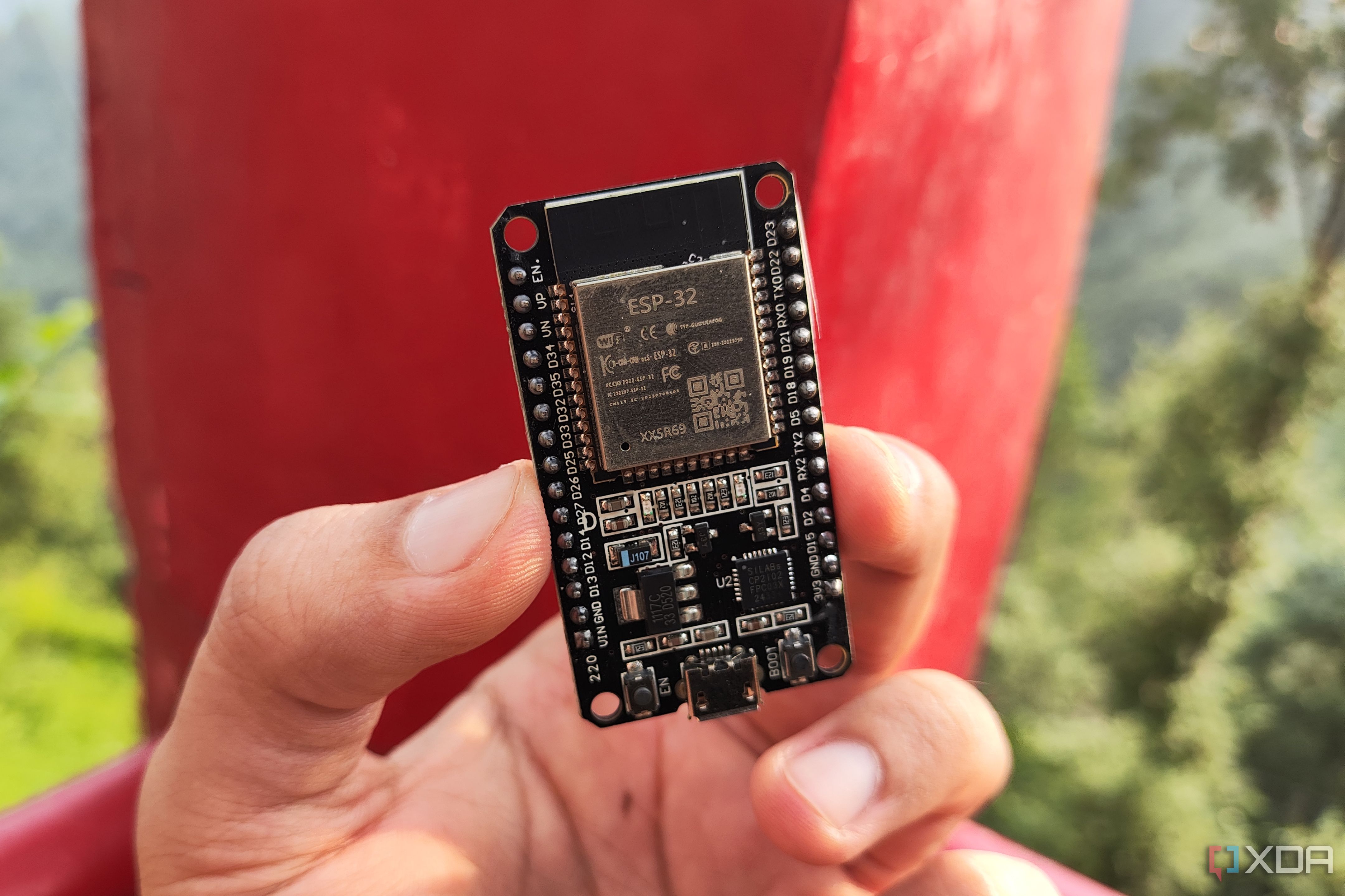 A person holding an ESP32