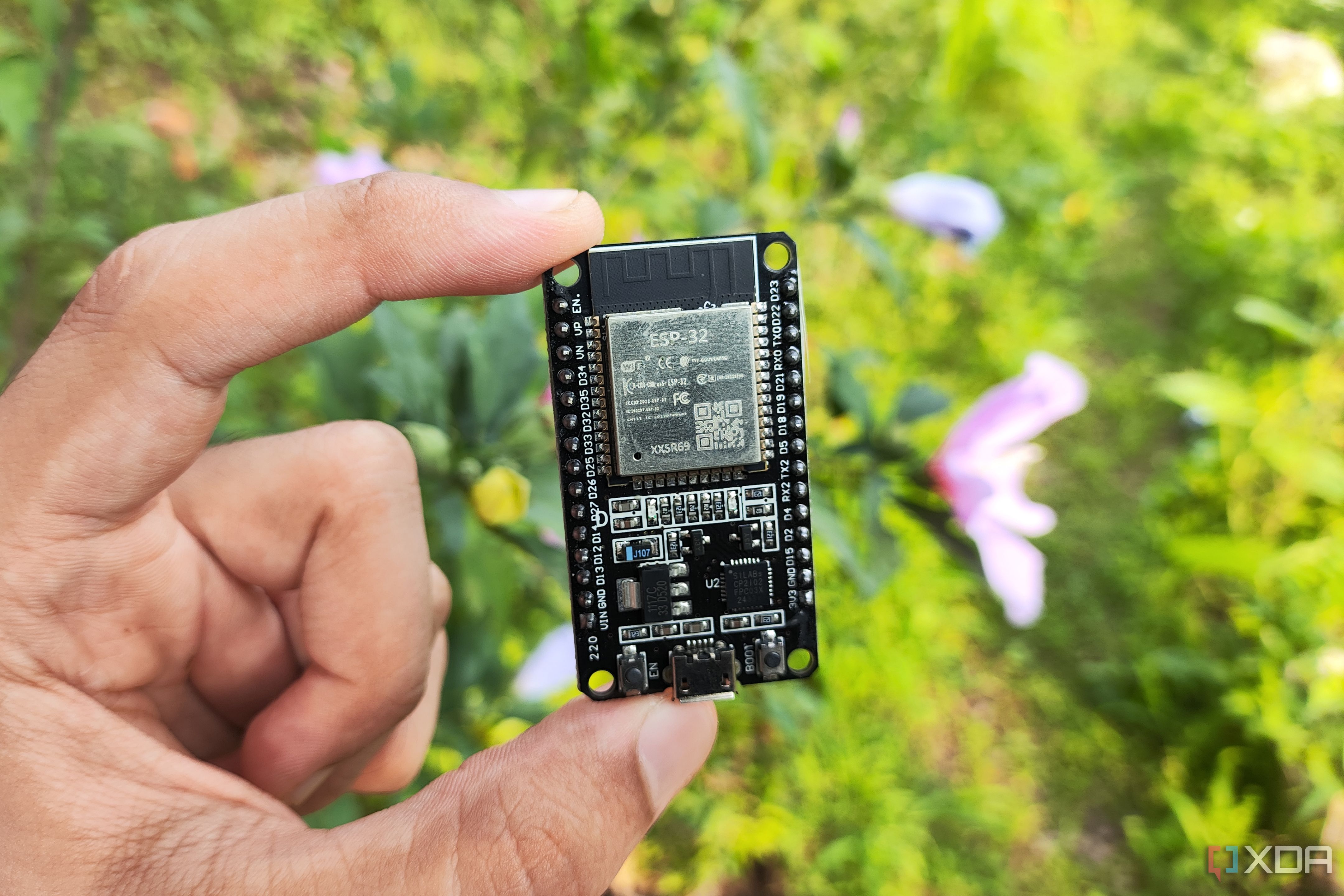 Person holding ESP32