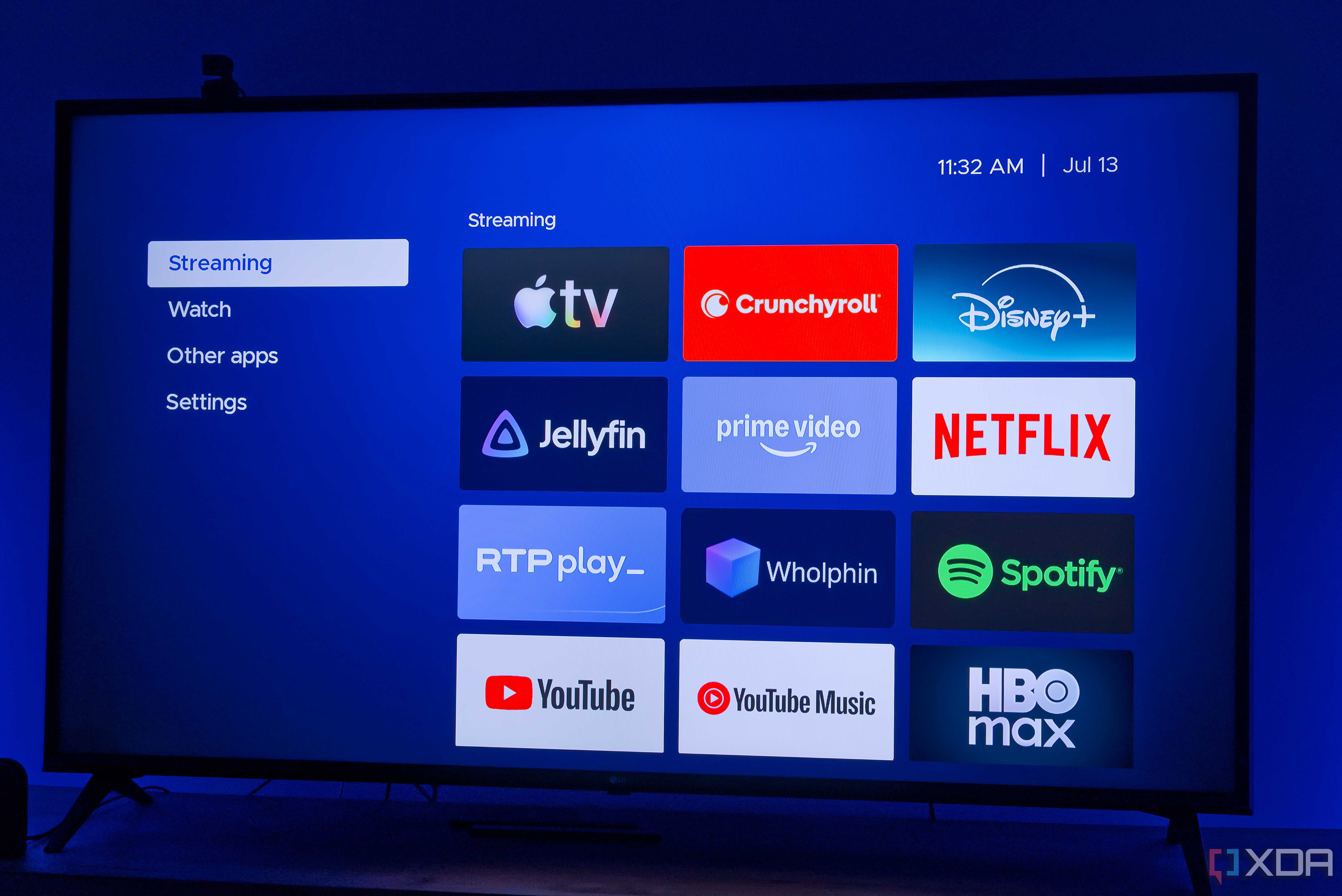A TV displaying a group of apps in Kyu Launcher for Android TV