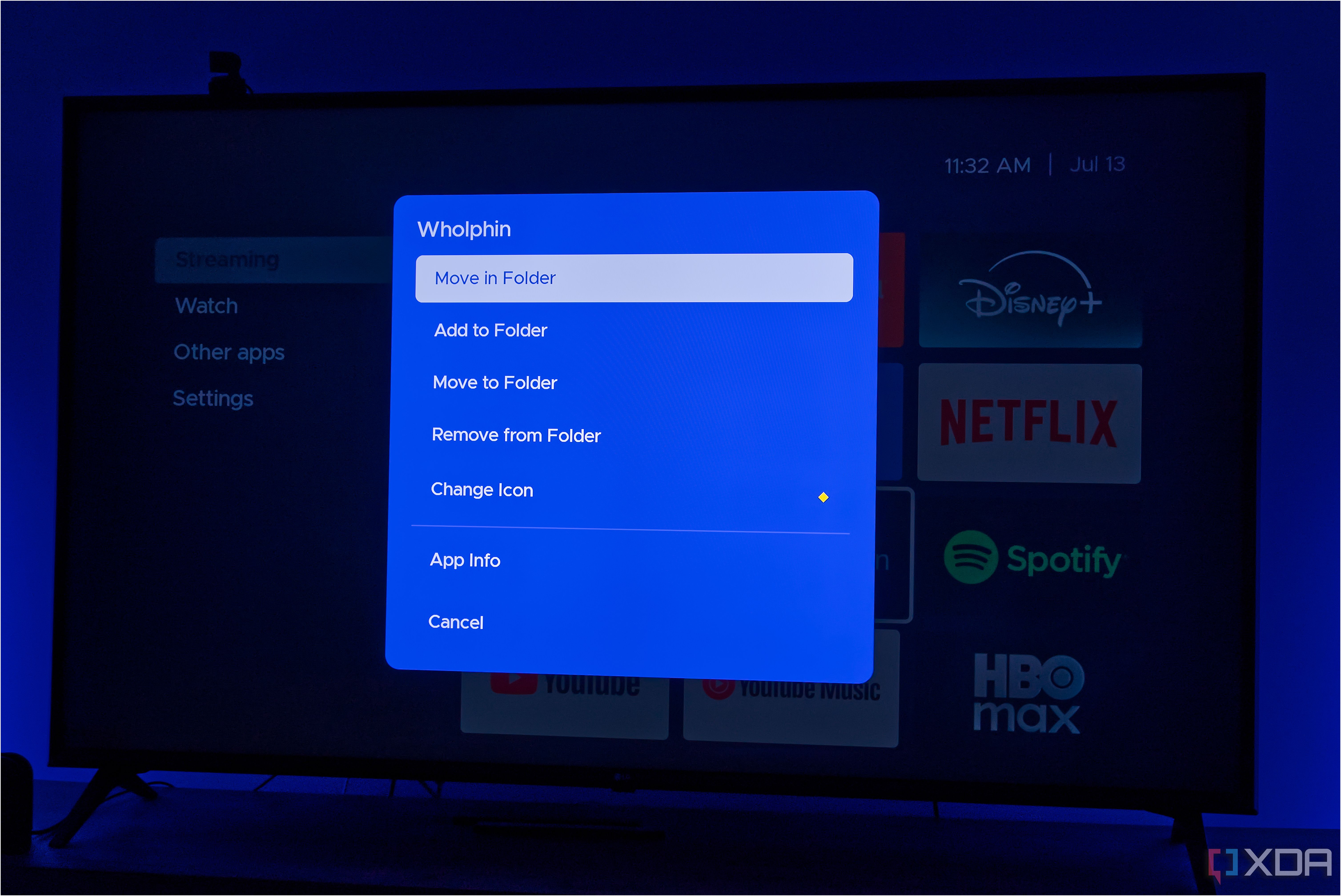 A TV displaying Kyuu Launcher for Android TV, with a menu of actions that can be taken on an app