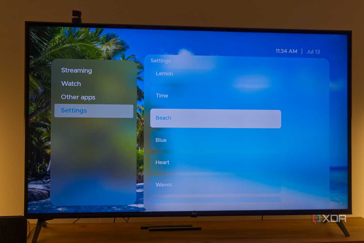 A TV displaying the Beach theme in Kyu launcher for Android TV