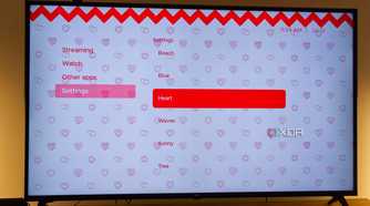 A TV displaying the Hearts theme in Kyu launcher for Android TV