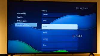 A TV displaying the Bluish theme in Kyu launcher for Android TV