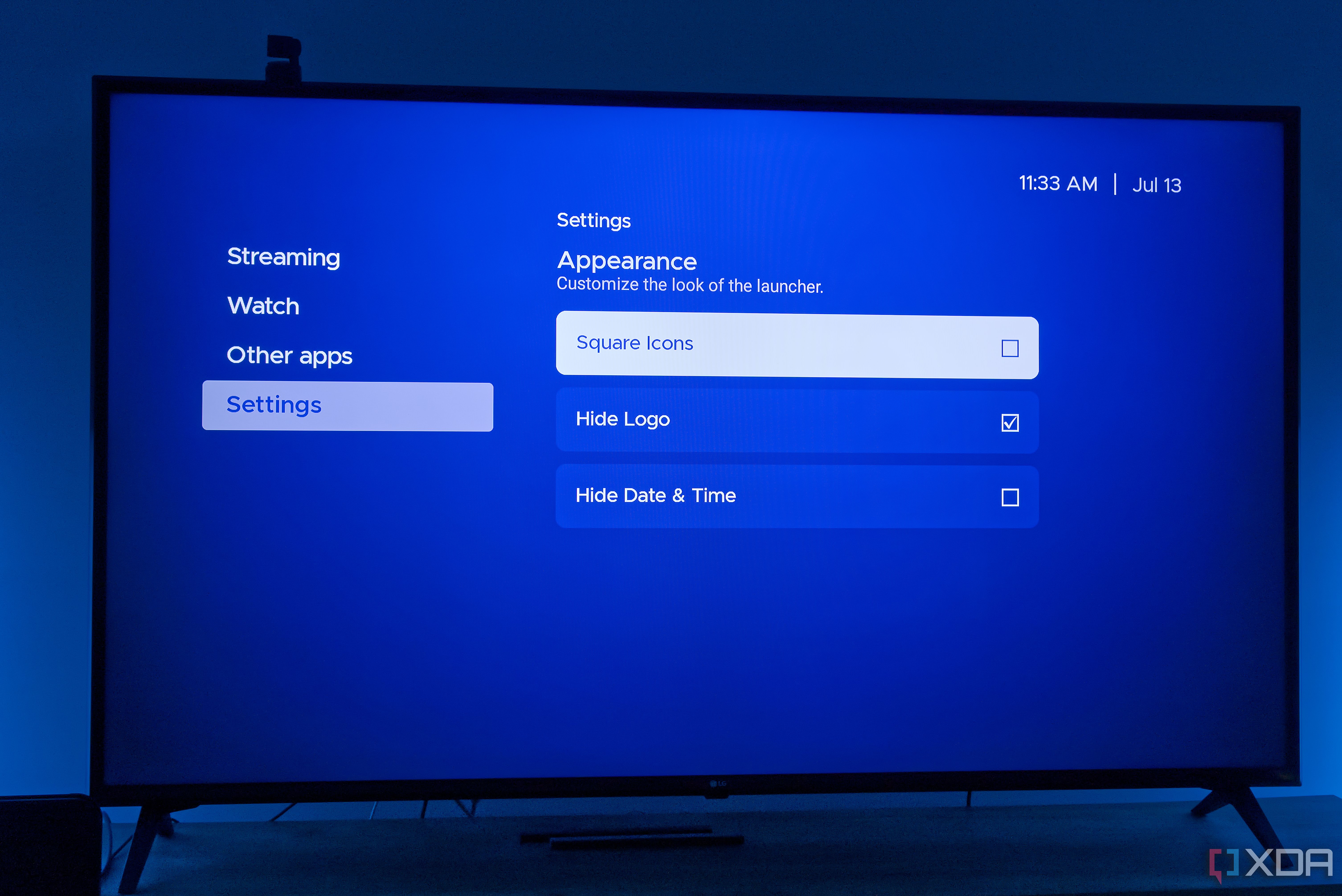 A TV displaying appearanace settings in Kyu Launcher for Android TV, including options for square icons, hiding the app log, and hiding the date and time
