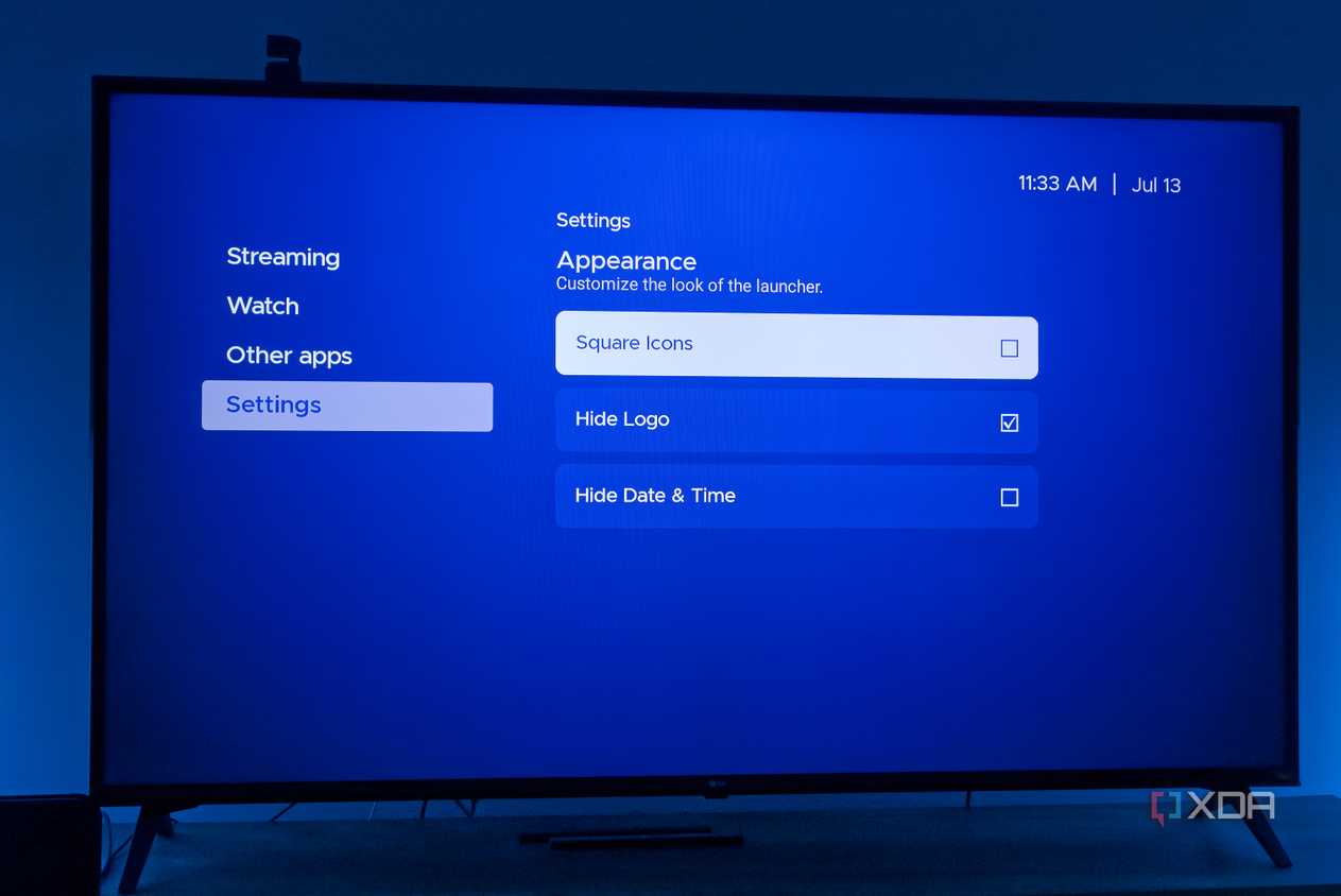 A TV displaying appearanace settings in Kyu Launcher for Android TV, including options for square icons, hiding the app log, and hiding the date and time