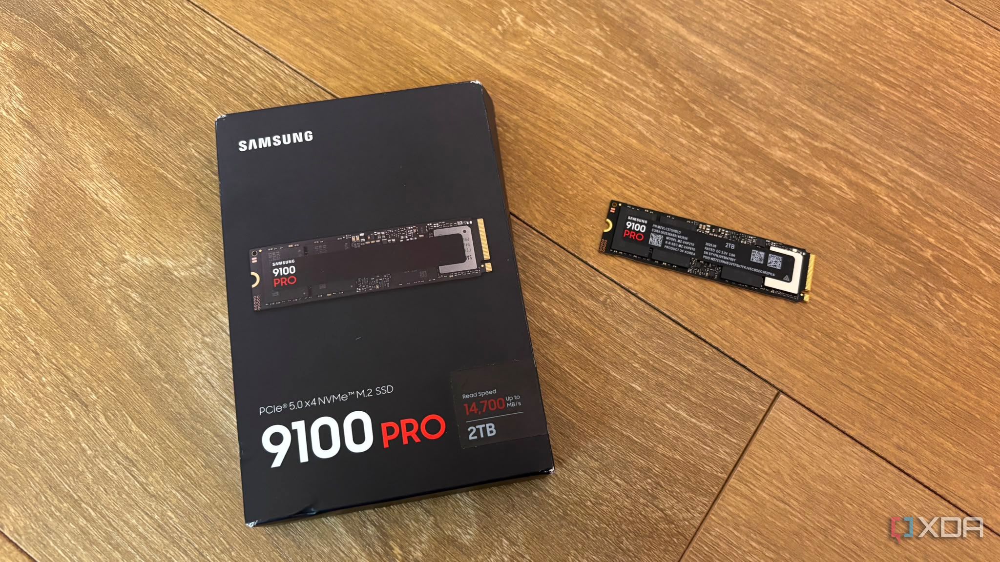 Samsung 9100 pro SSD next to box on floor