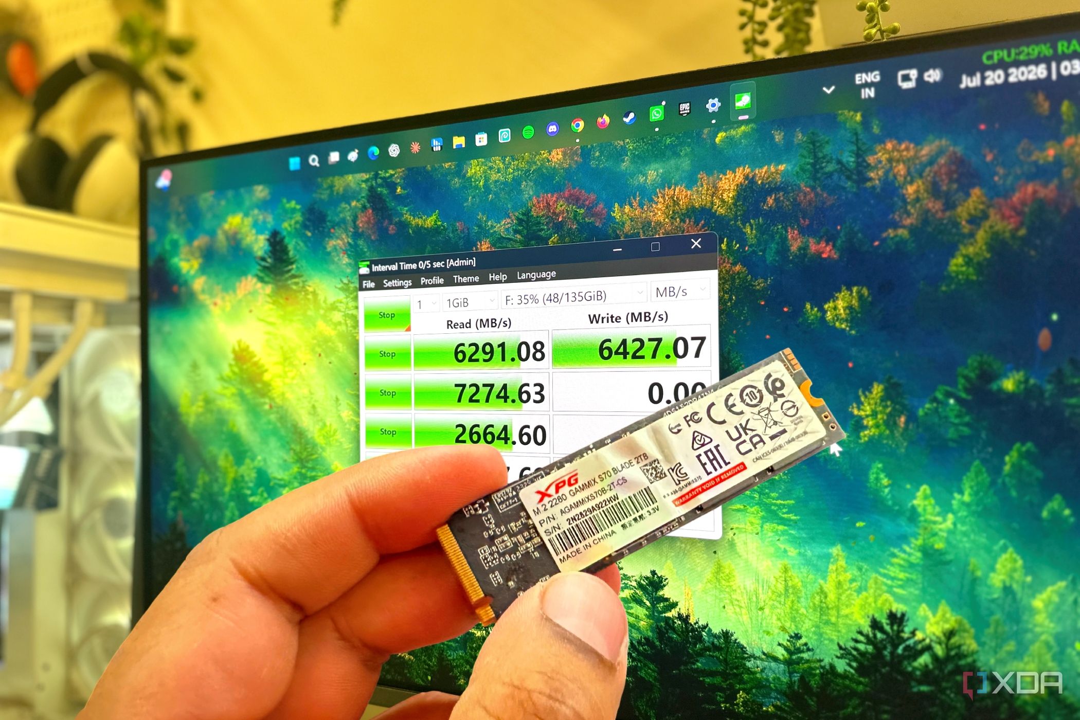 XPG Adata Gammix S70 Blade 2TB SSD with CrystalDisk Mark running on the PC.