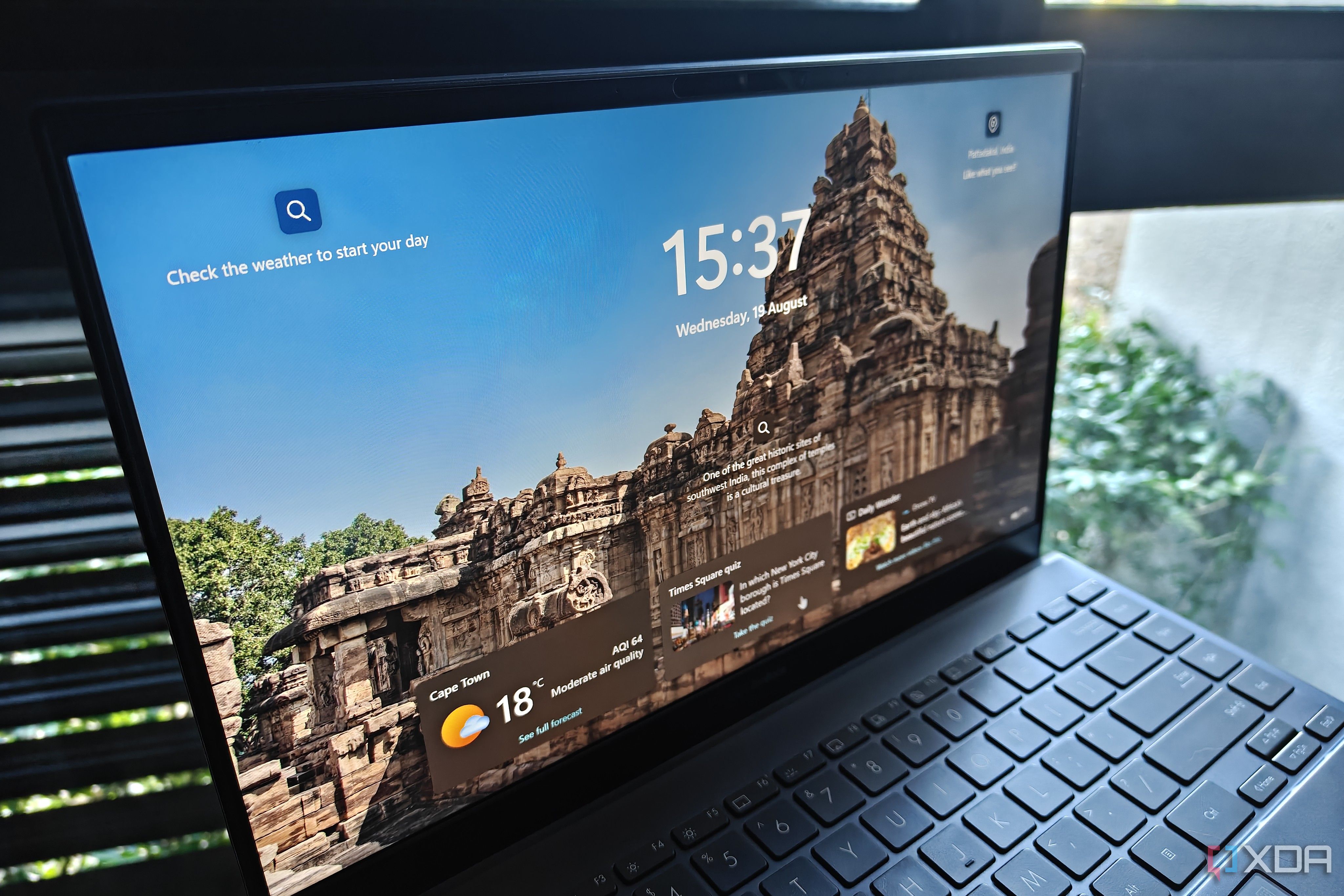 a laptop screen with widgets on the lock screen