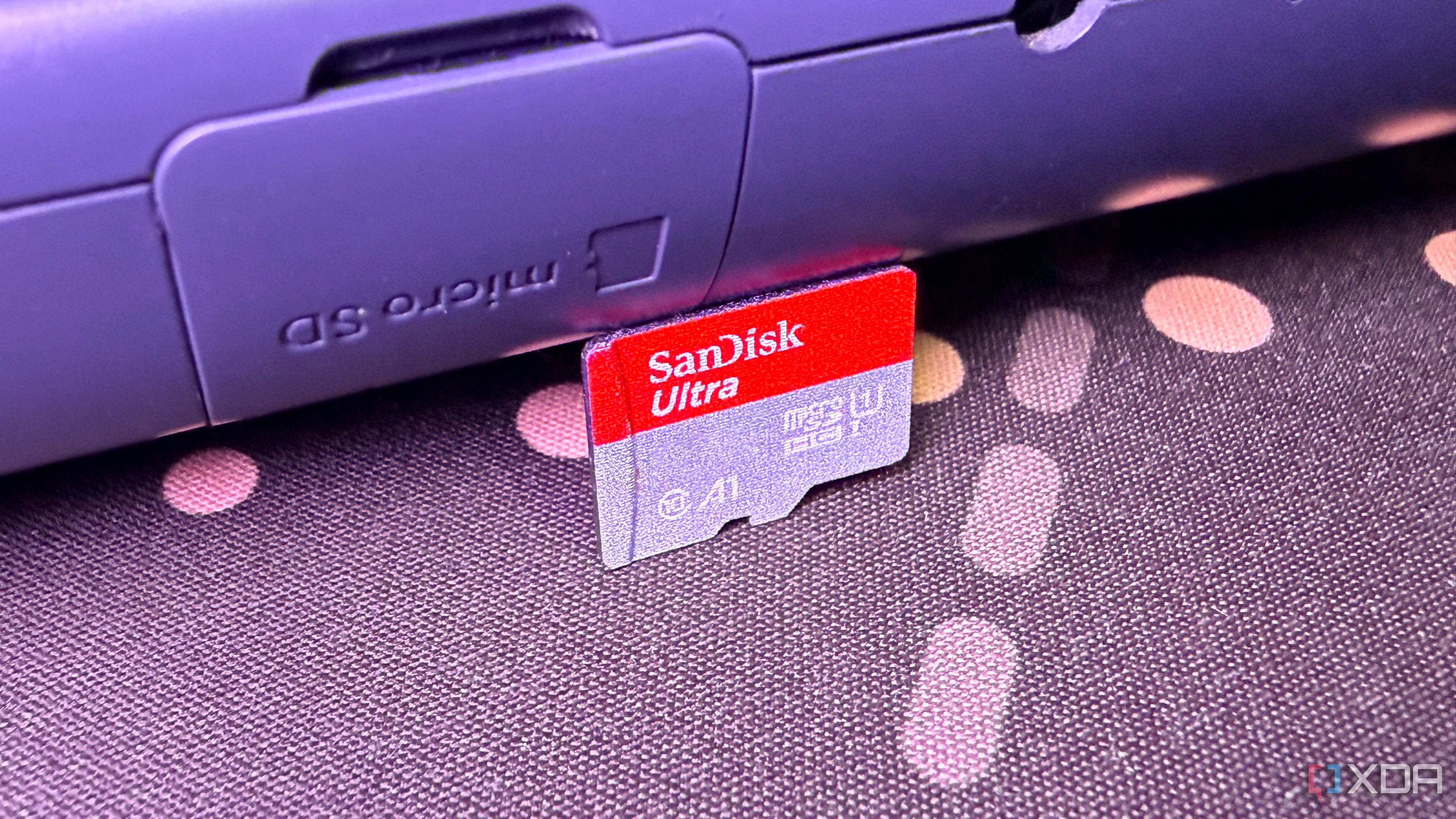 A MicroSD card next to a microSD card slot