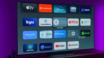 A TV showing the home page on the AT4K Launcher, showing a list of apps on a dark background