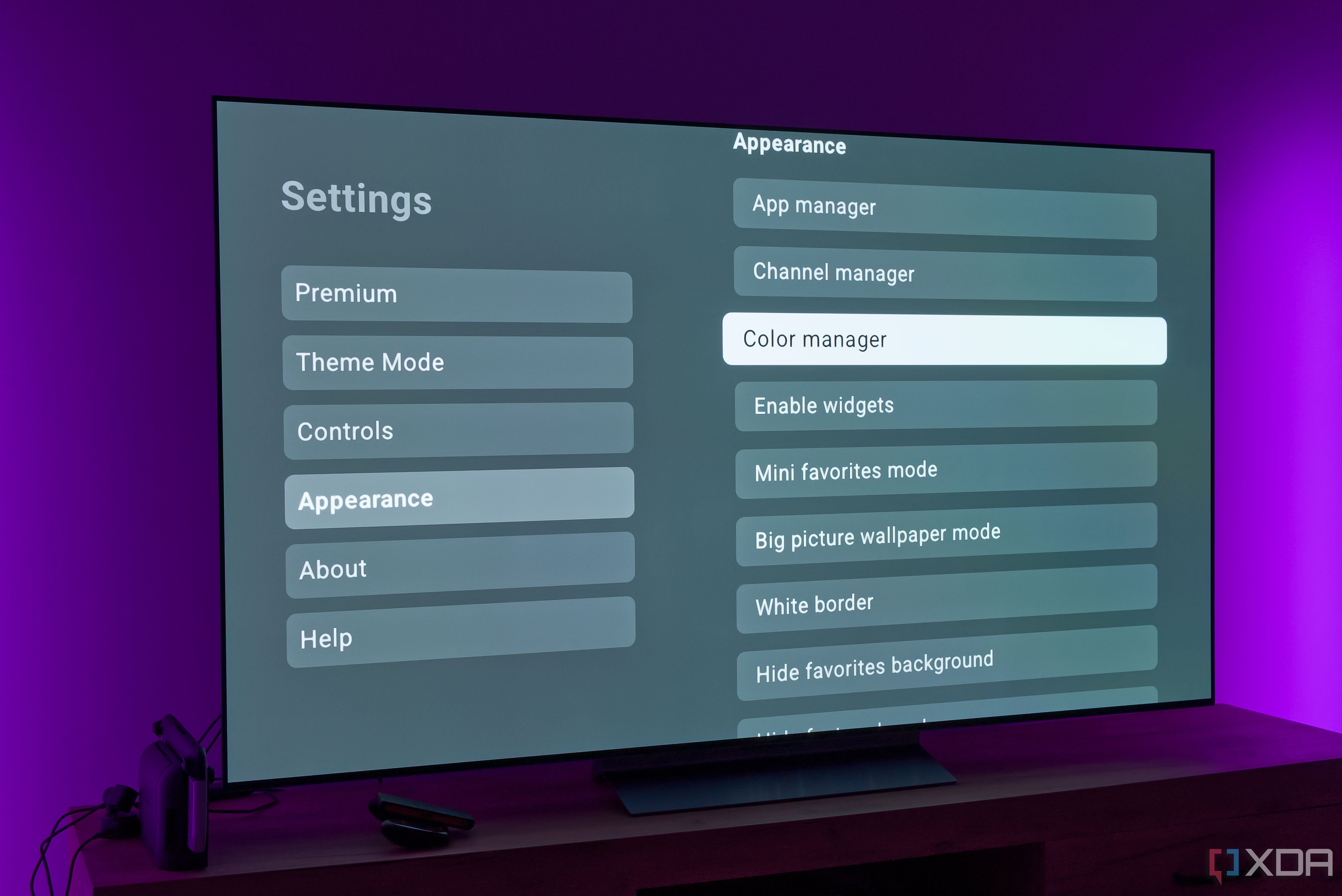 A TV displaying various appearance settings for the AT4K Launcher for Android TV