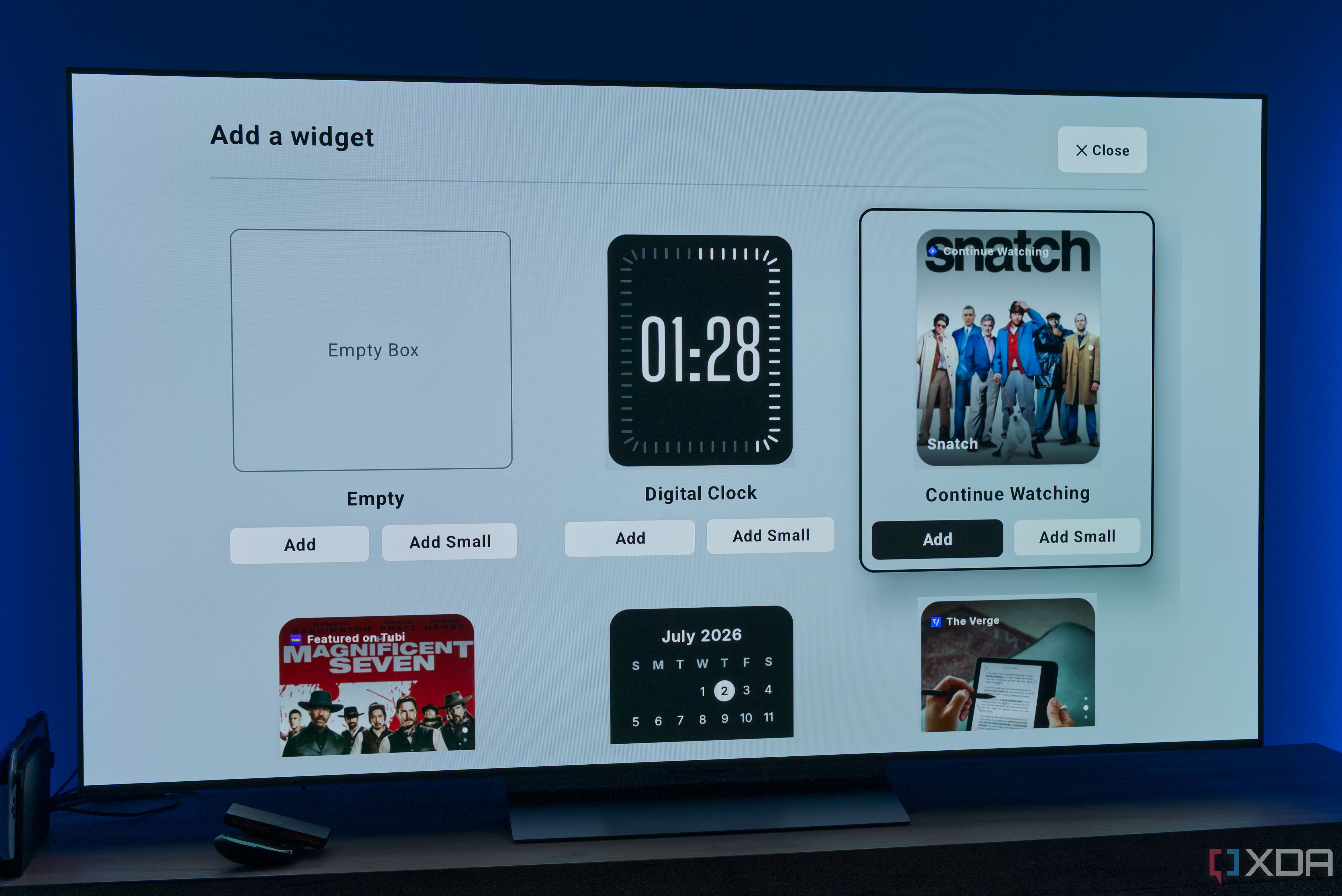 A TV displaying a list of available widgets to add, including an empty box, a digital clock, a "continue watching" card, a Tubi card, a calendar, and an RSS feed