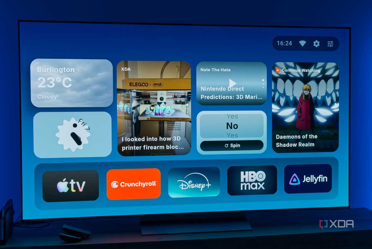 A TV displaying the homepage for AT4K Launcher for Android TV, with a small weather widget, a small analog clock widget, one full-size RSS feed widget for XDA, a small podcast widget, a small "Yes or no" spinner, and a "continue watching" card
