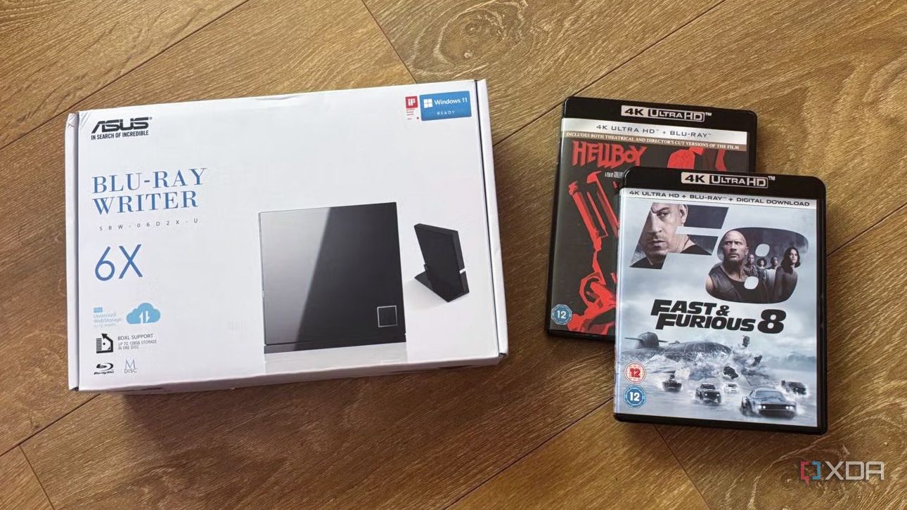 A Blu-ray writer beside physical Blu-Ray movies 