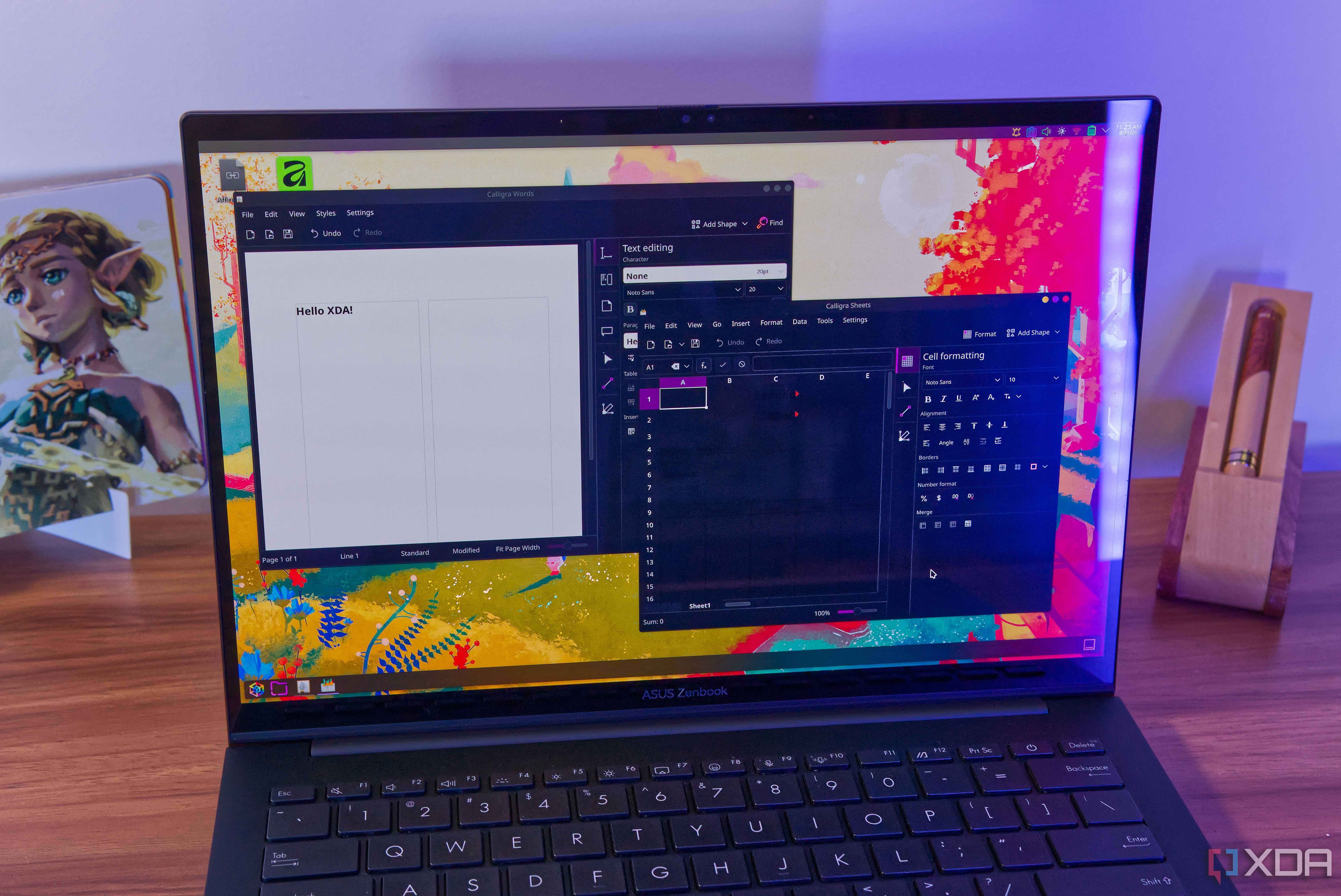 A laptop running Calligra Words and Calligra Stage on KDE Plasma