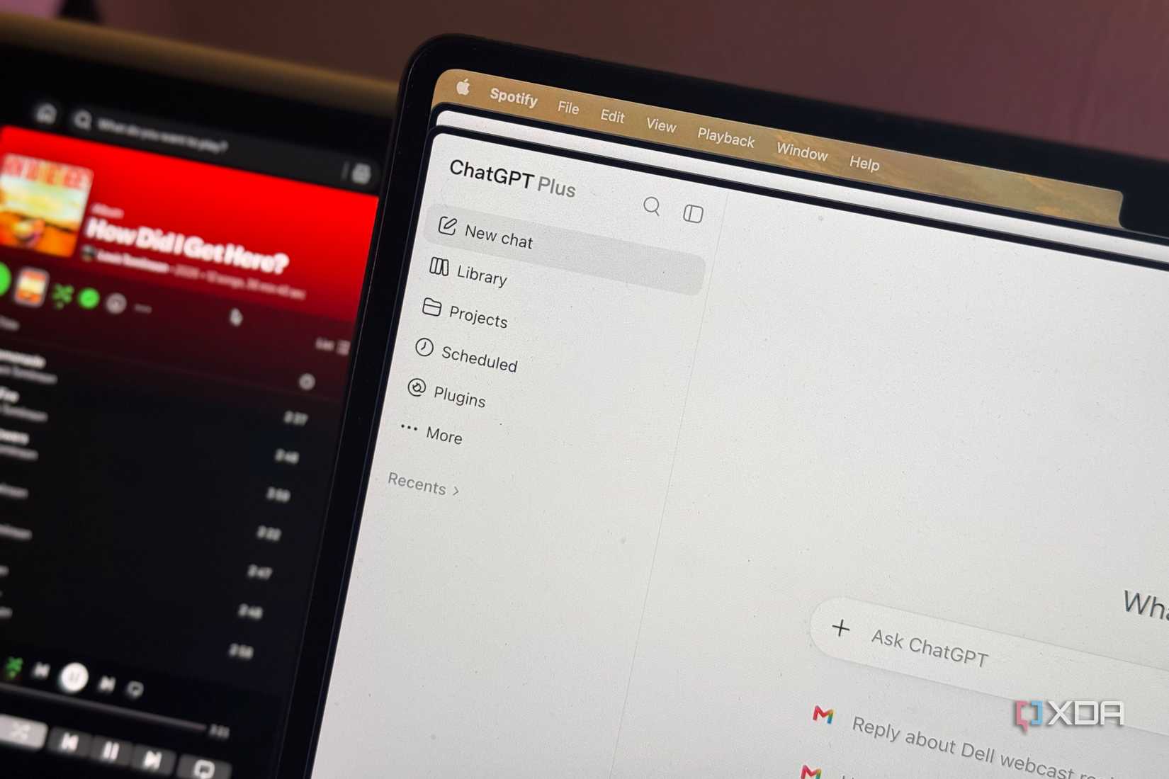 ChatGPT on MacBook with Spotify in the background