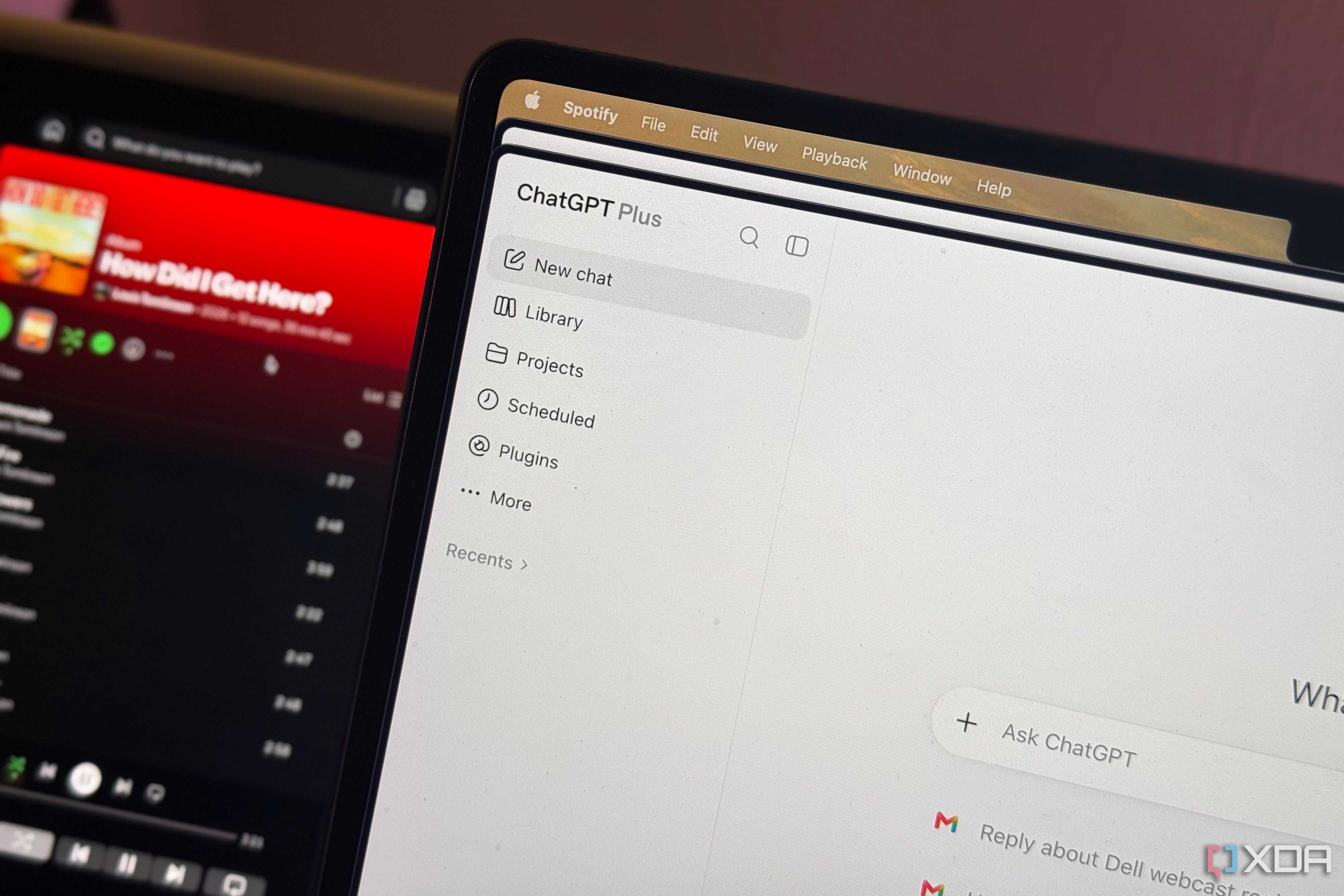 ChatGPT on MacBook with Spotify in the background