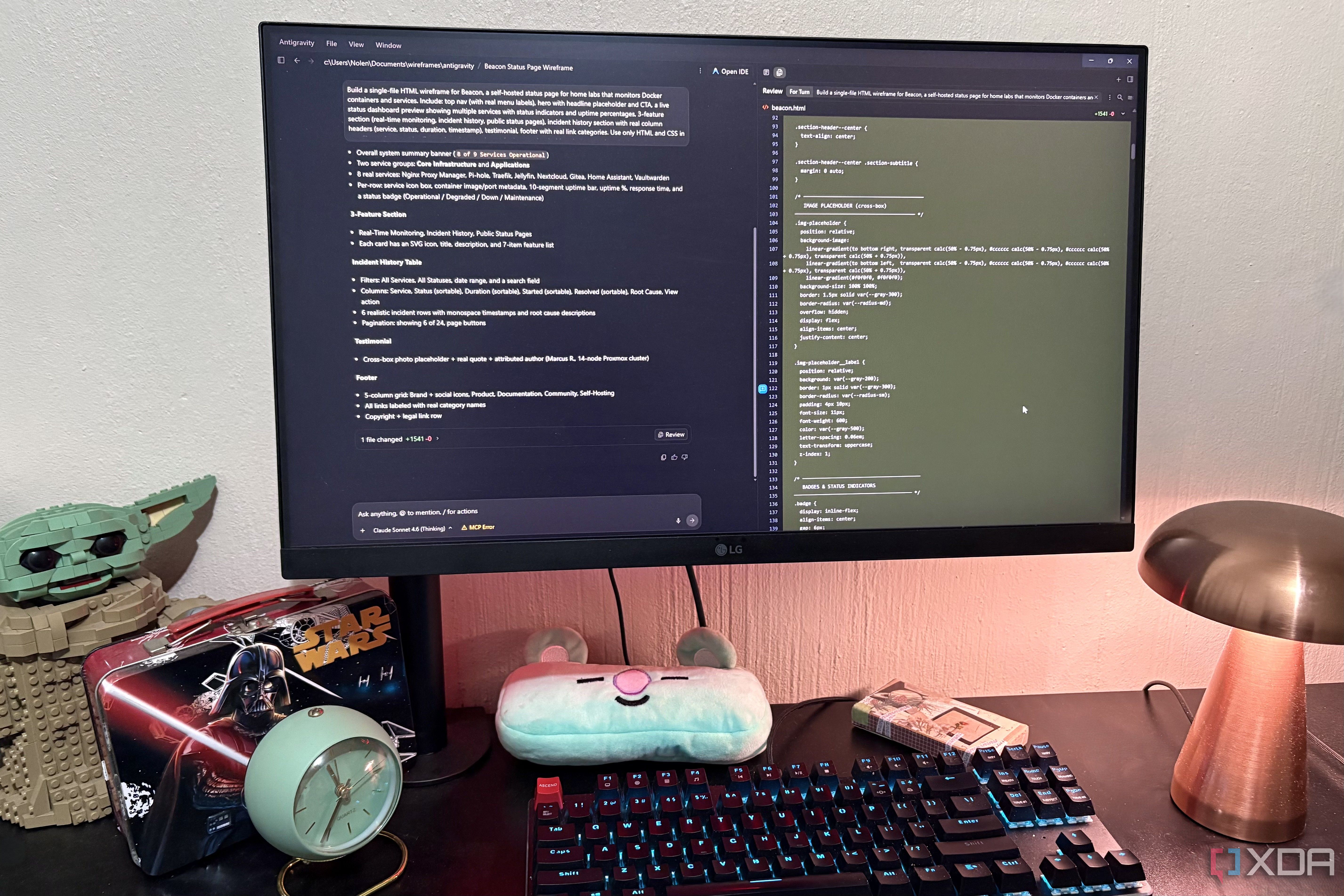 code in antigravity on desktop pc, lego and lamp in view