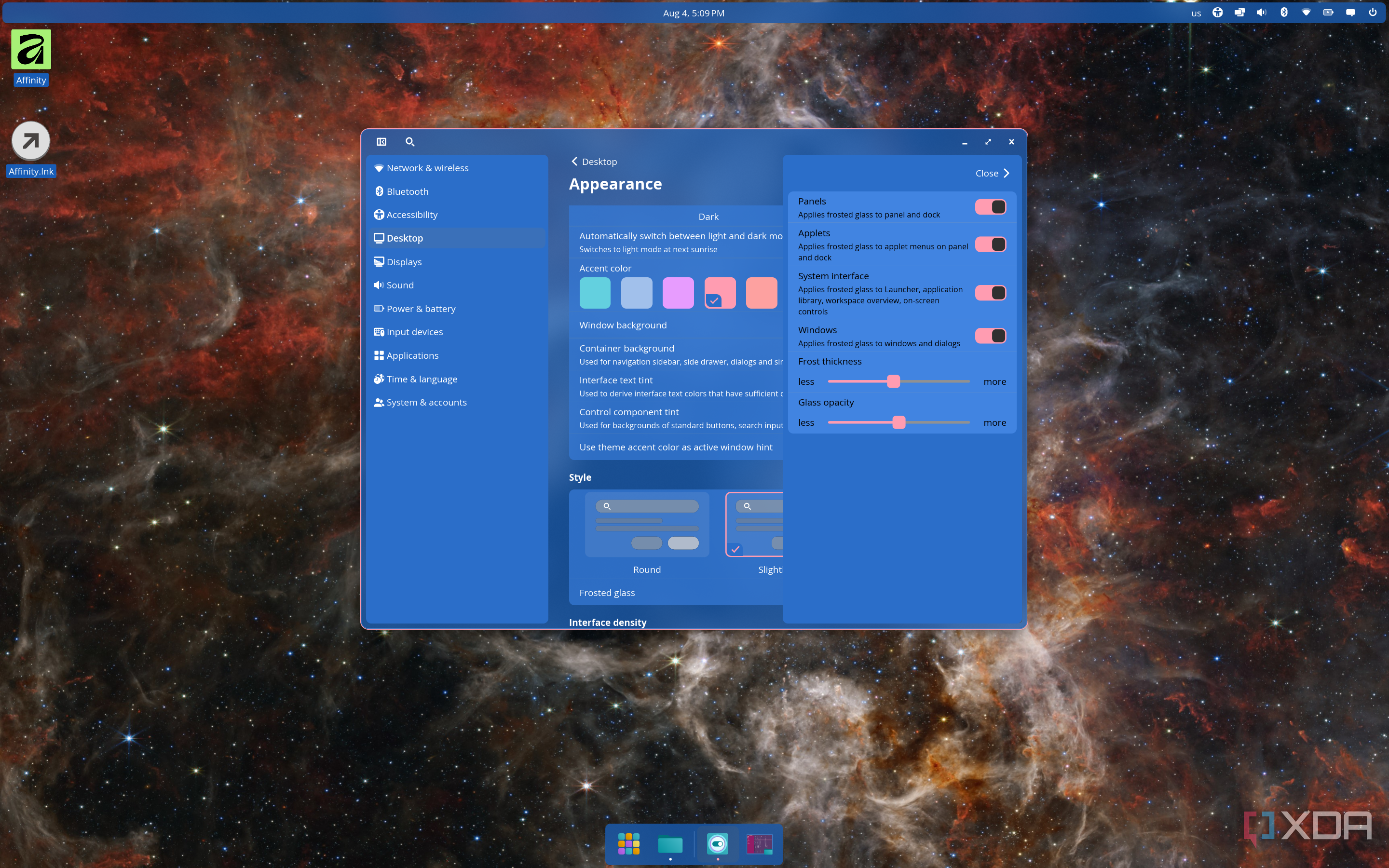 Screenshot of COSMIC settings showing options for customizing the frosted glass effect. The desktop has a blue theme applied
