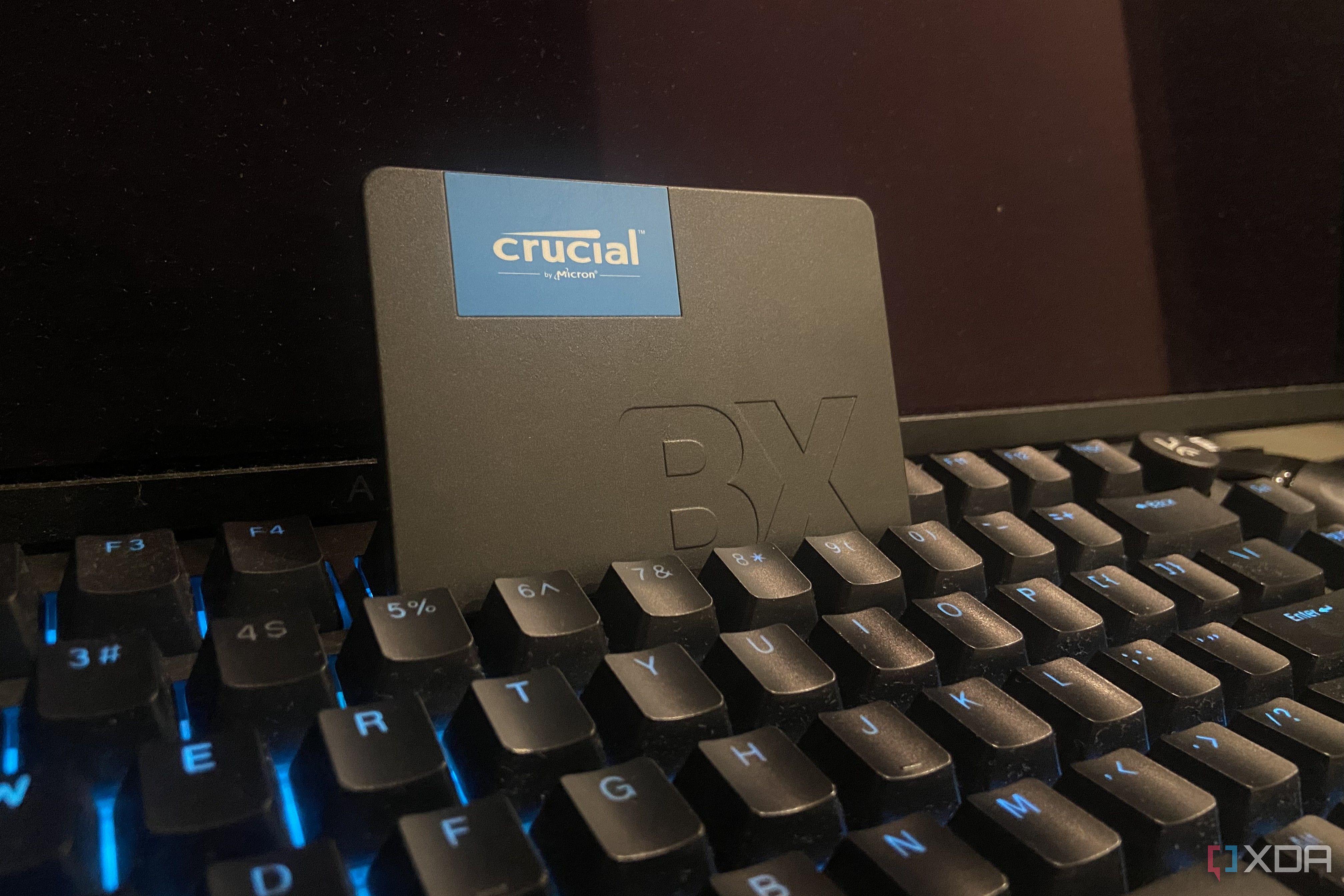 An image of a Crucial BX 500 SATA 3 SSD on a keyboard.