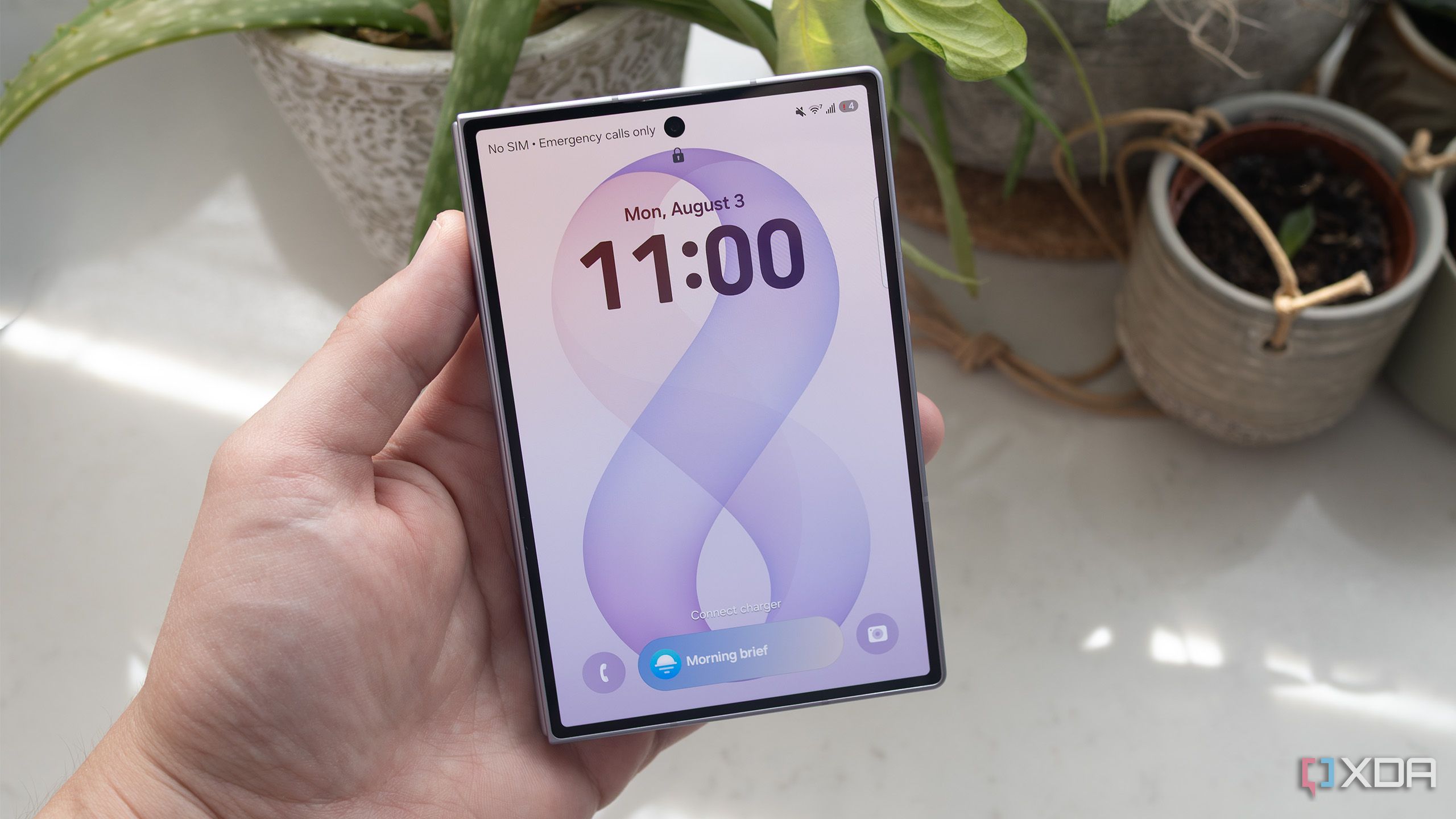 Holding the Galaxy Z Fold 8 folded