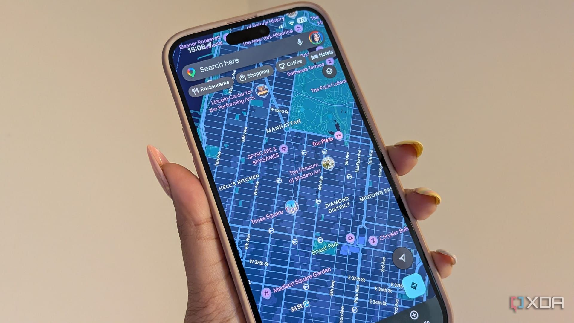 google maps being shown on phone being held up 