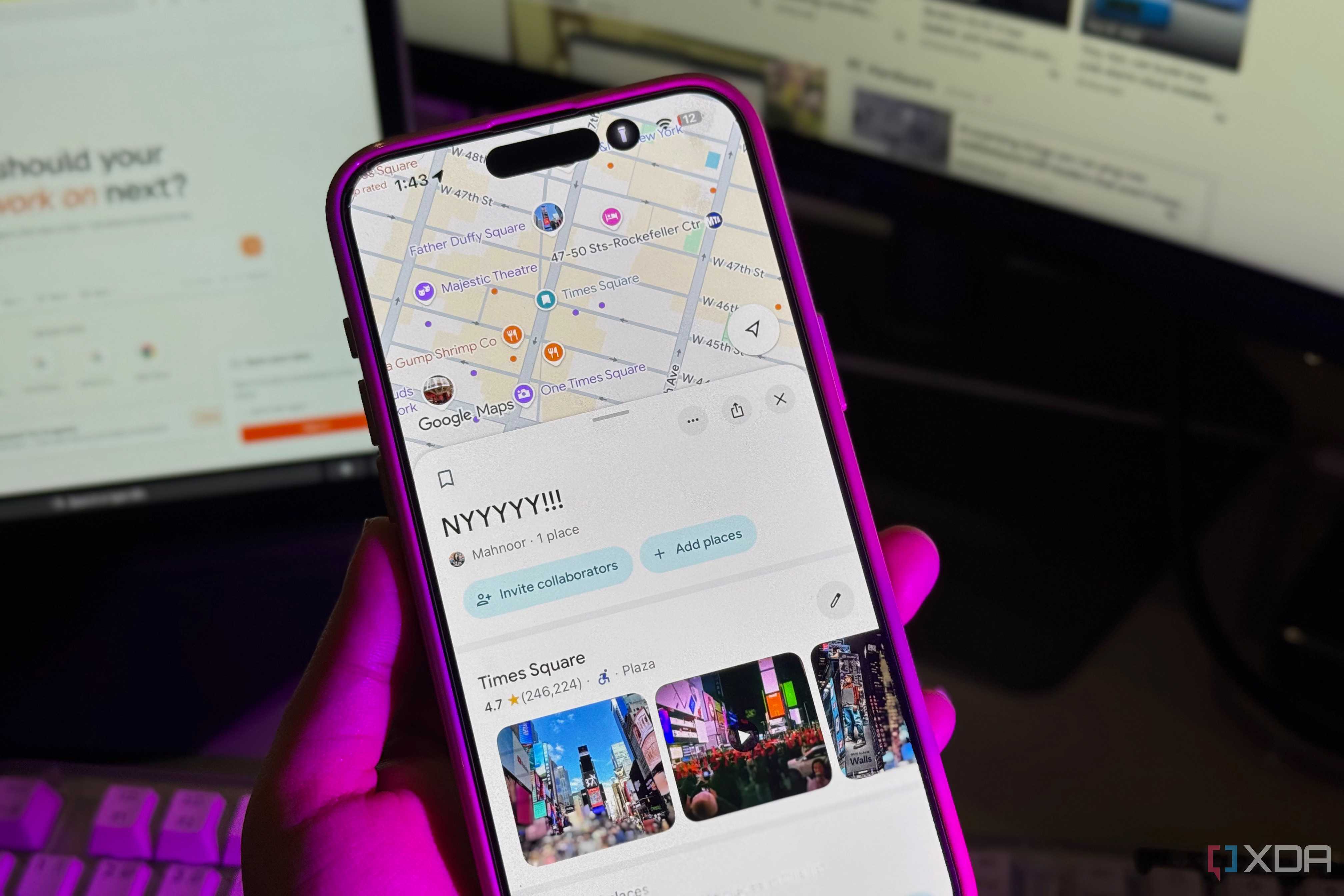 Hand holding an iPhone showing a Google Maps saved list called NYYYYY!!! with Times Square