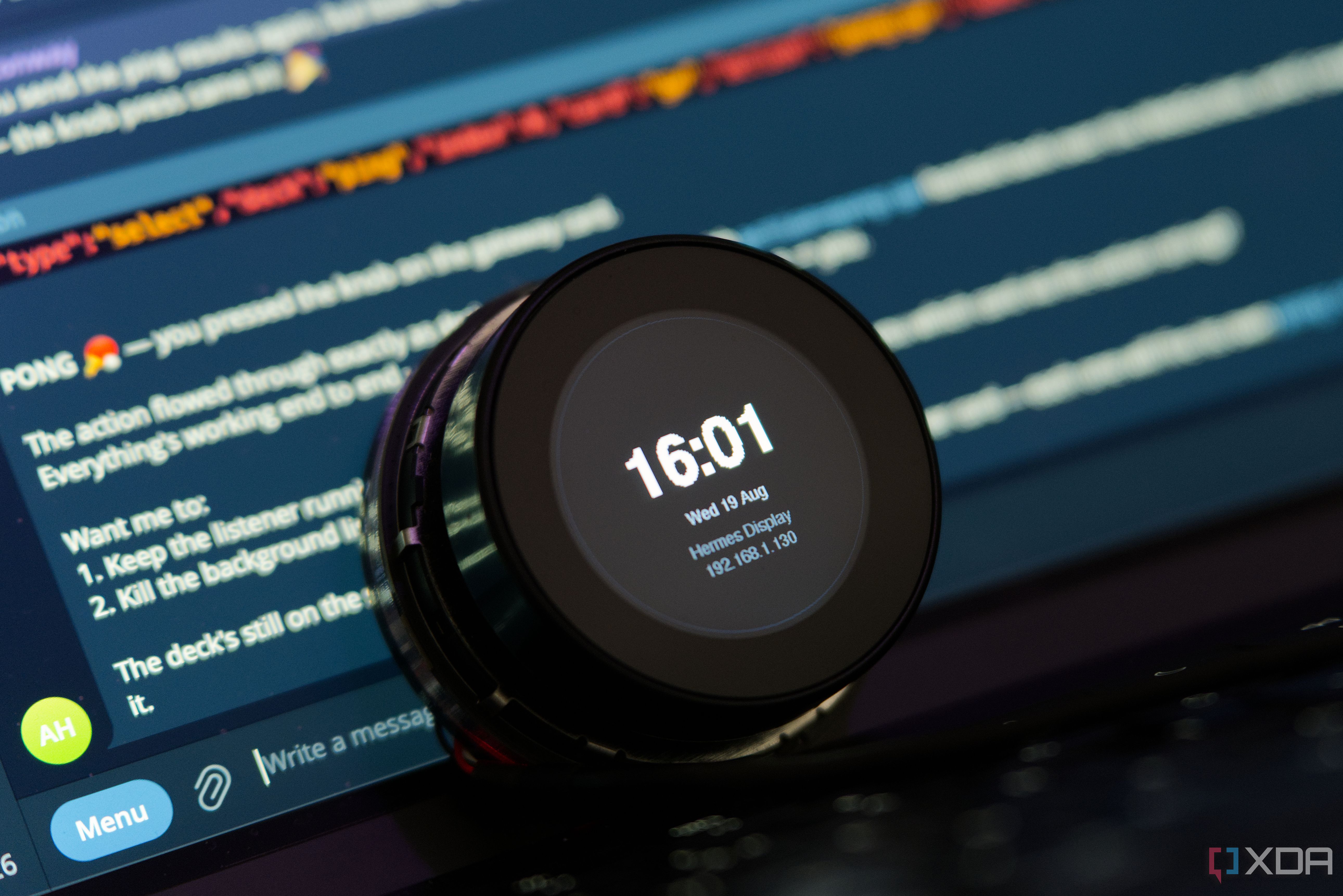 Hermes Display showing Telegram reacting to a button press in the background