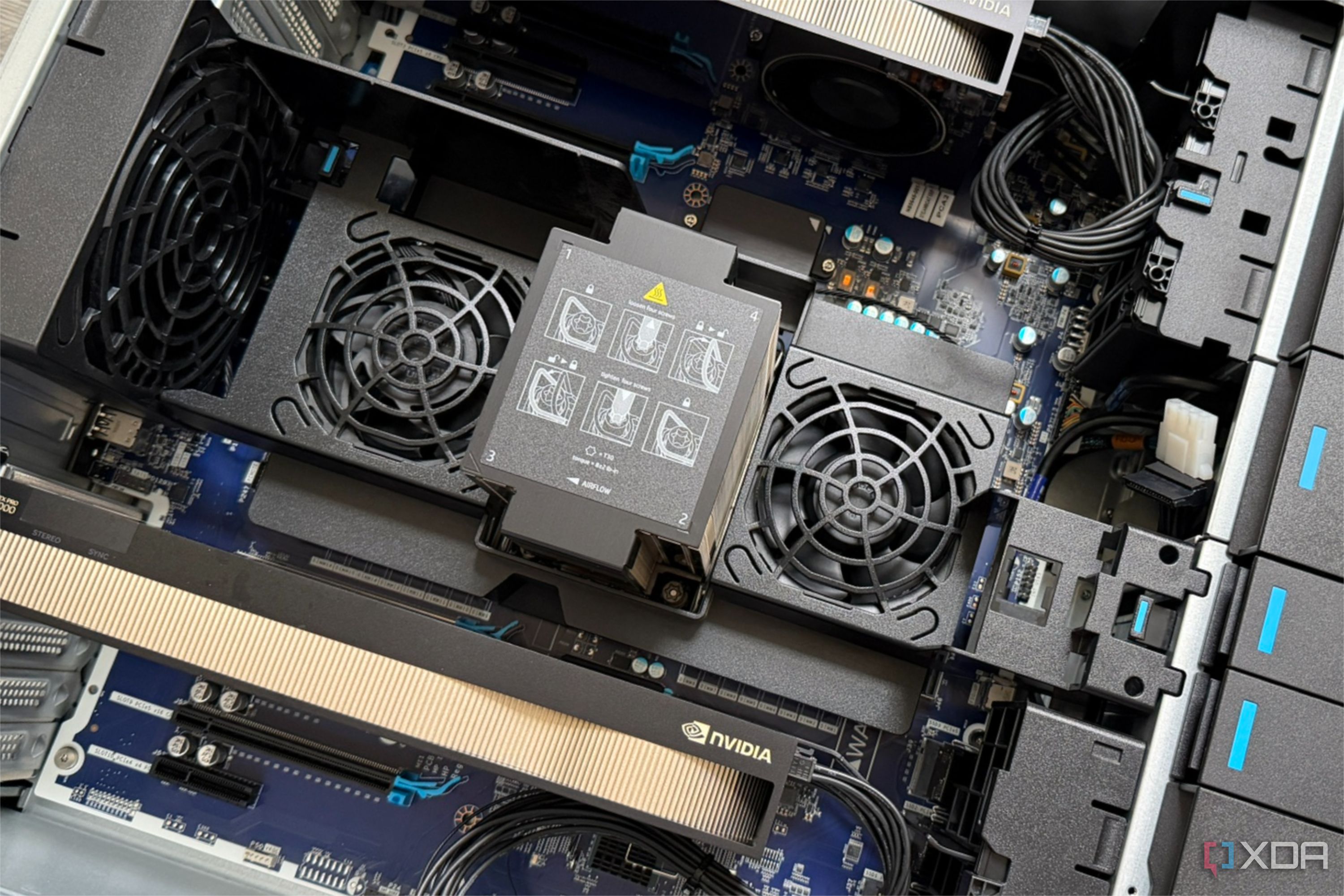 home server with side panel off showing two gpus and large cpu and ram cooler