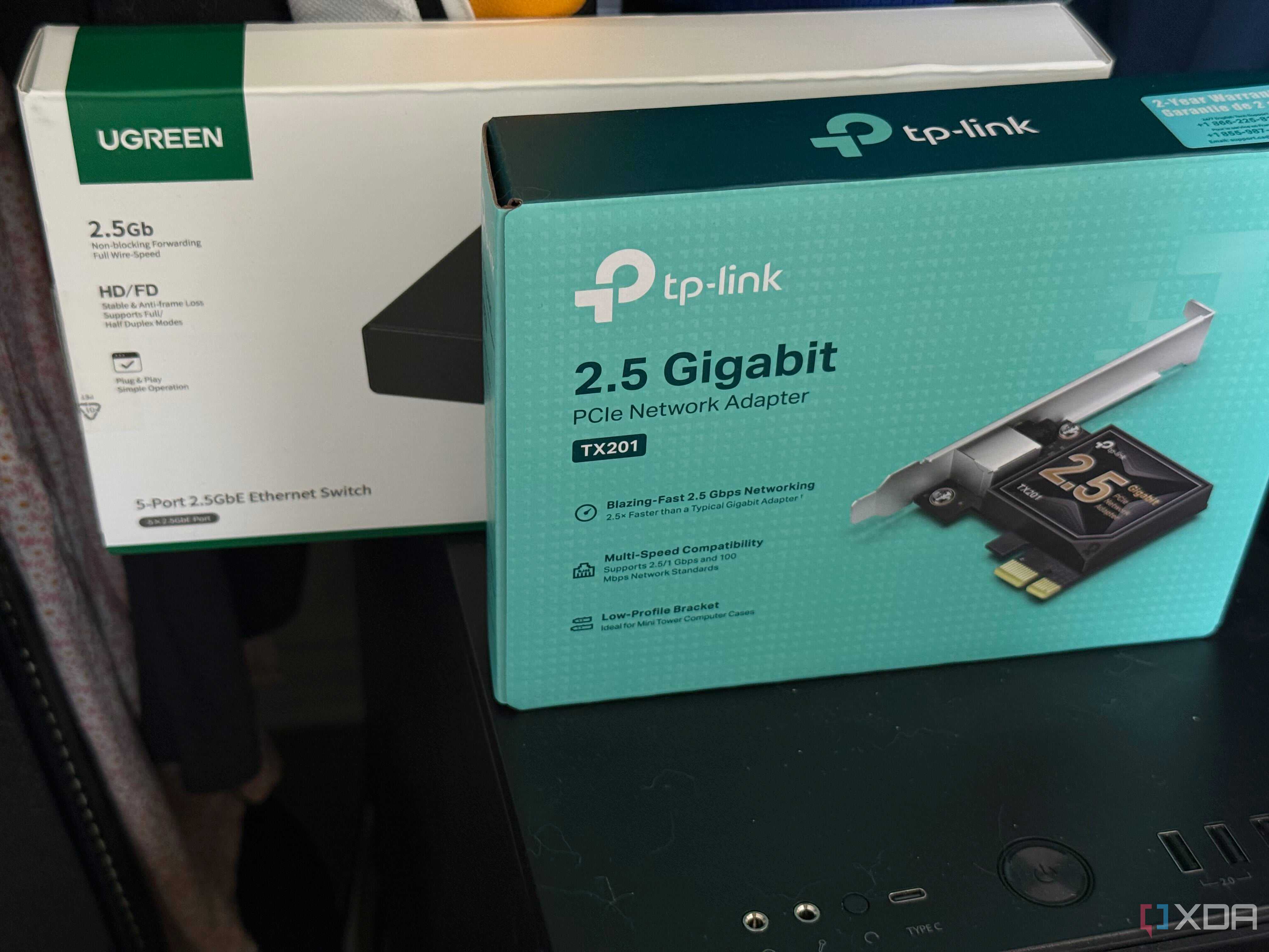A photo of two multi-gig devices on top of a PC case