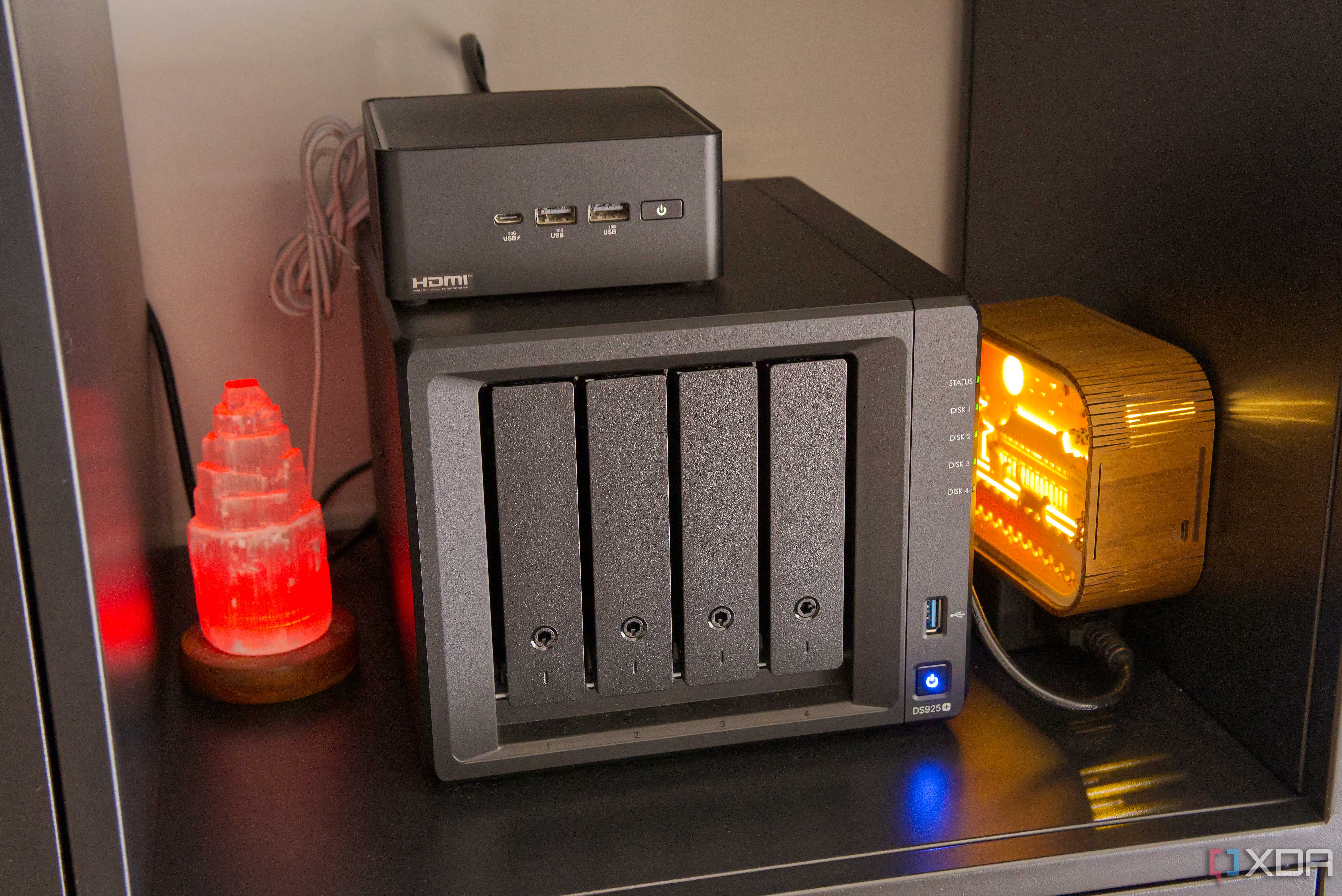 A mini PC on top of a NAS enclosure
