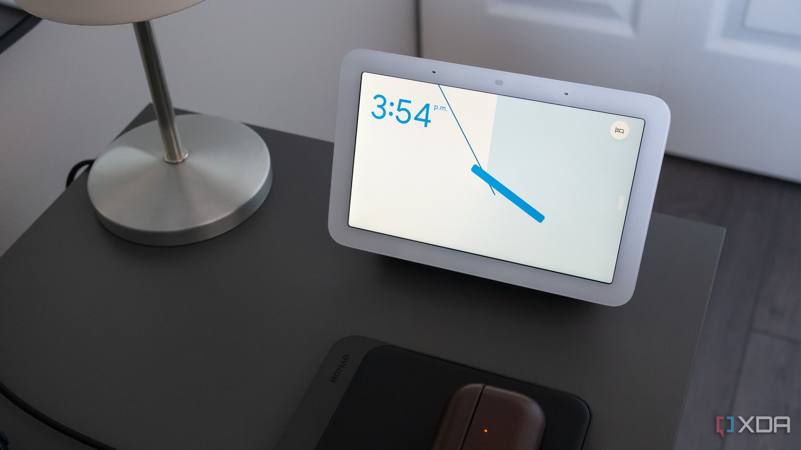 A Nest Hub sitting on a desk 