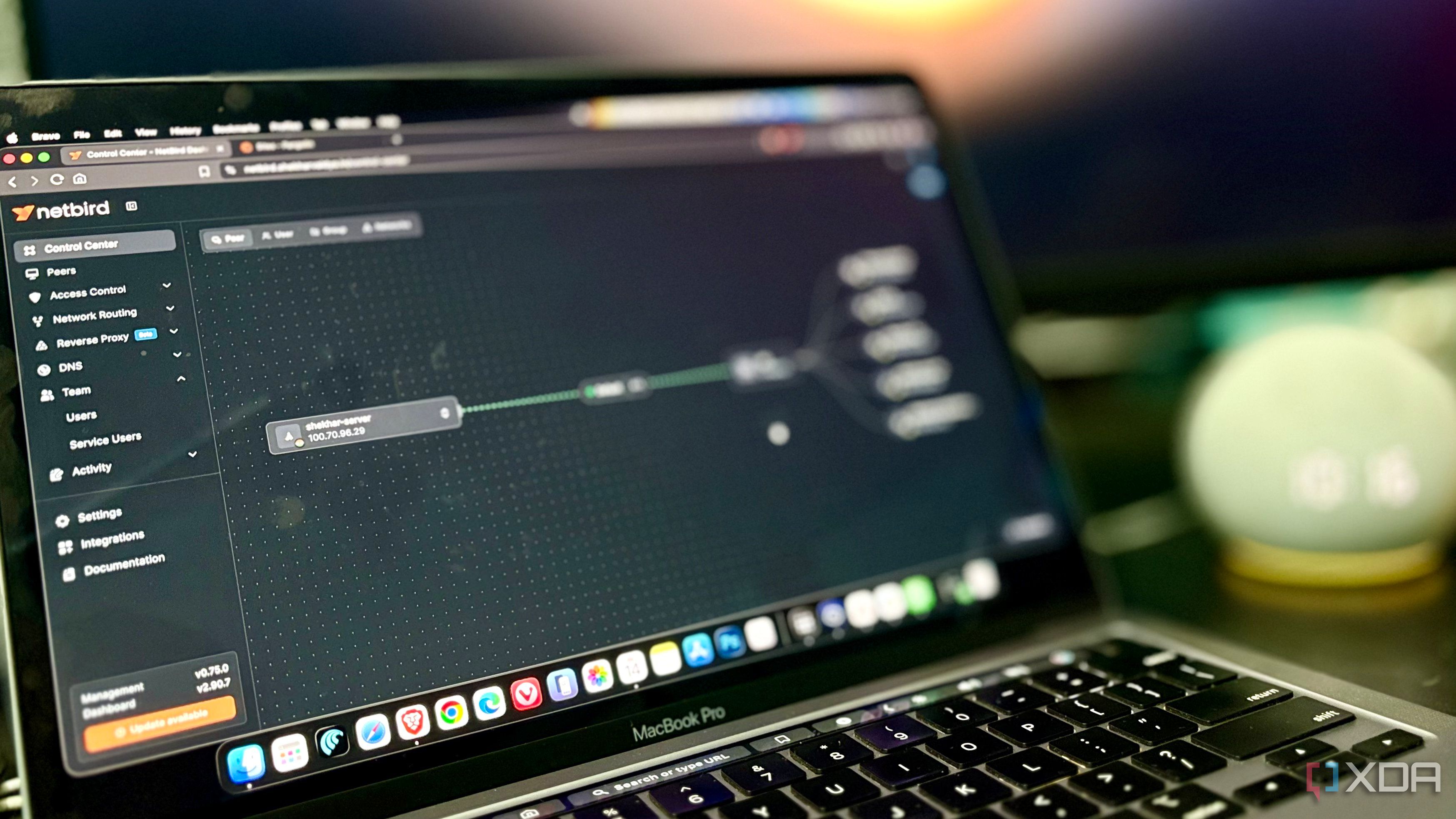 NetBird control center dashboard open on a MacBook Pro showing the mesh network