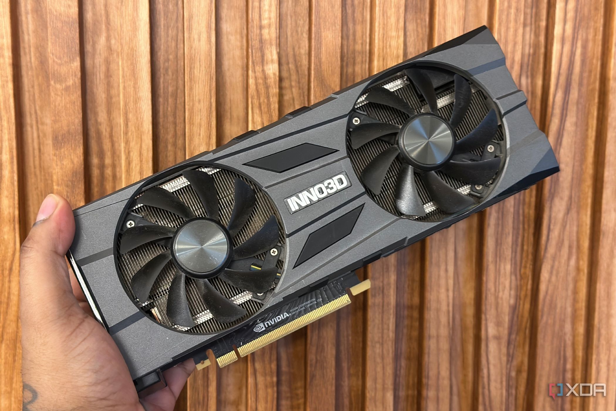 An Nvidia GeForce RTX 2070 Super in hand.
