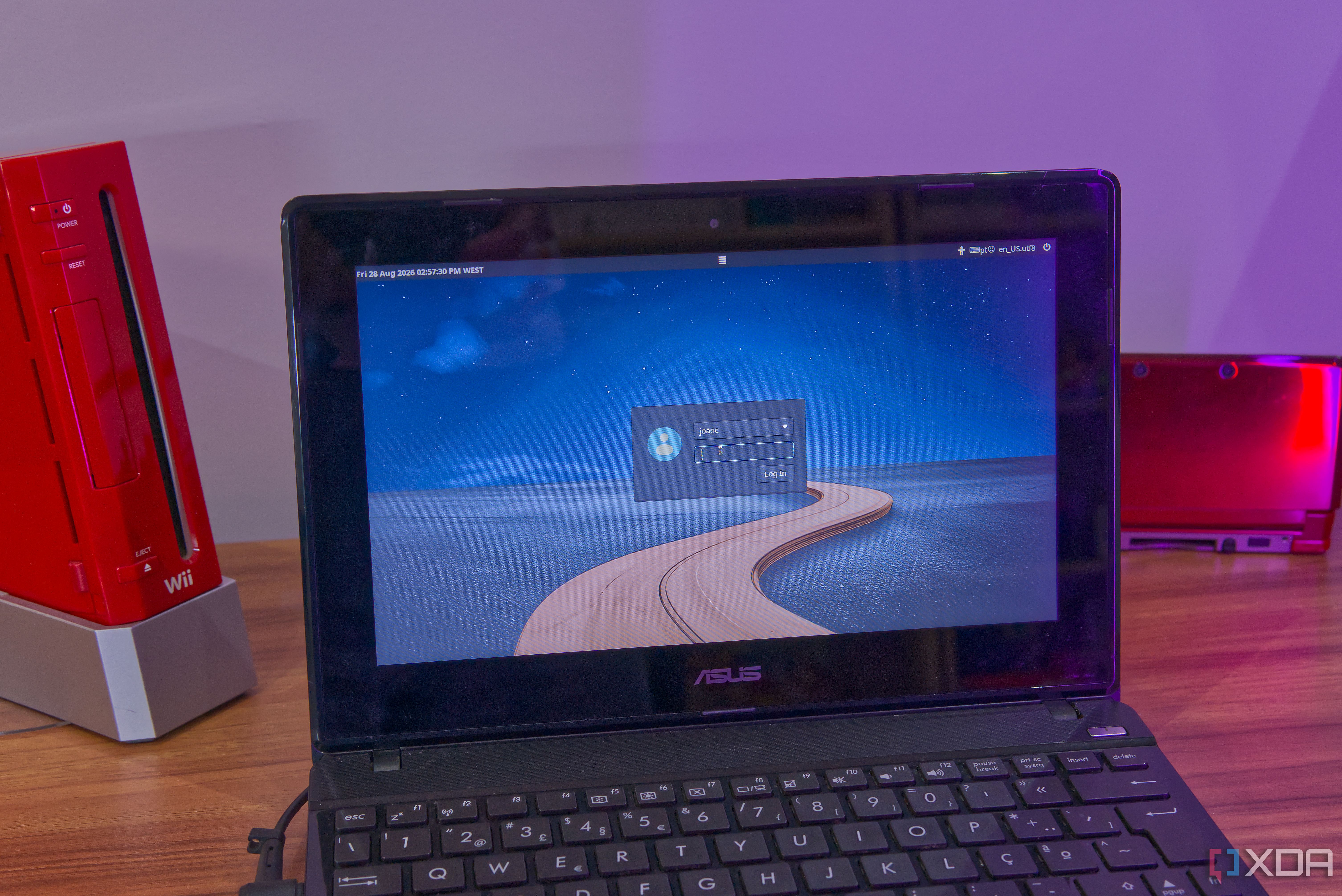 A laptop running MX Linux, displaying the login screen